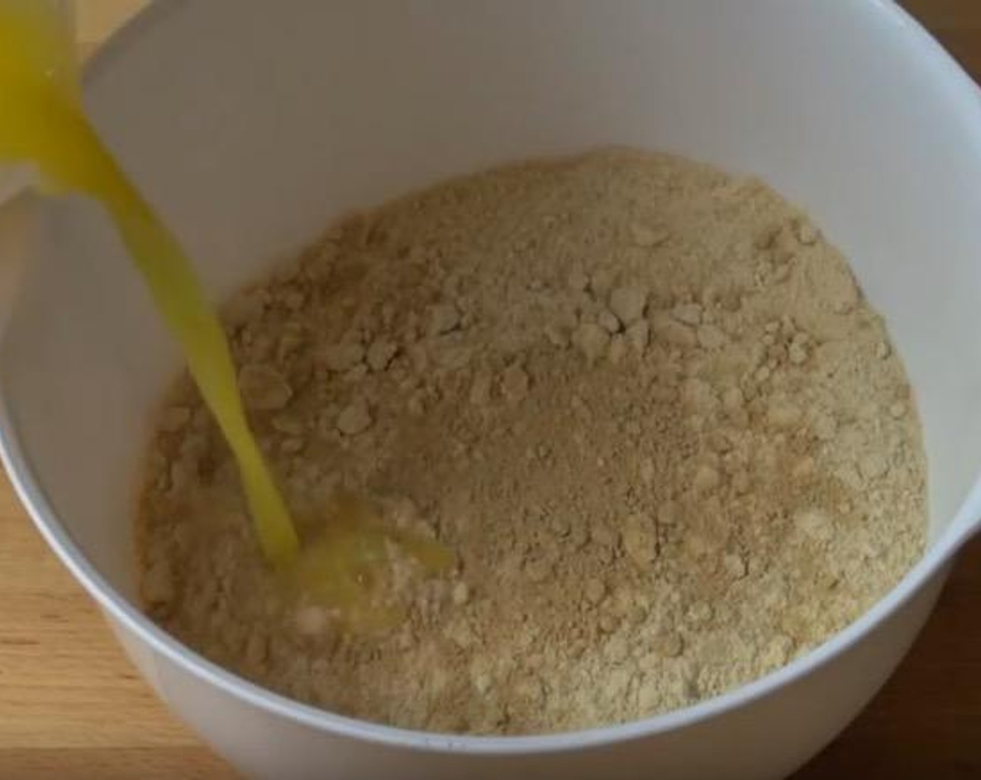 step 1 In a mixing bowl, add Graham Crackers (3 cups), Ground Ginger (1 tsp), and Butter (1/2 cup). Stir until ingredients come together.