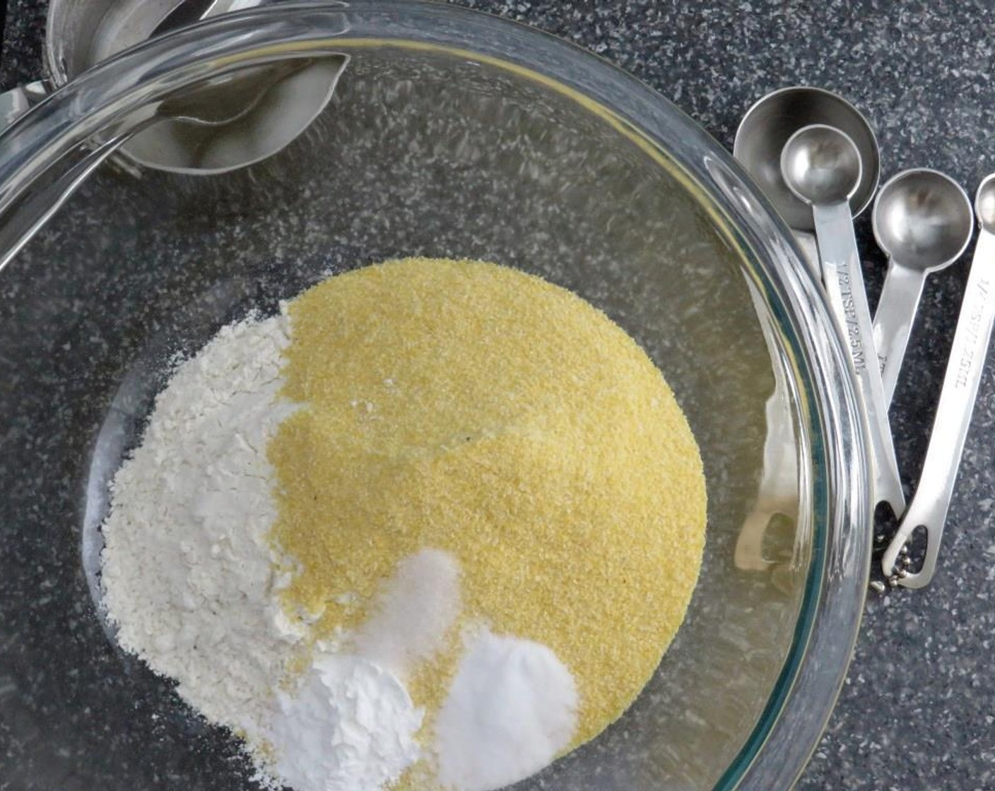 step 2 In a large bowl combine All-Purpose Flour (1 cup), Cornmeal (1 cup), Baking Powder (2 tsp), Baking Soda (1/2 tsp) and Salt (1/4 tsp).