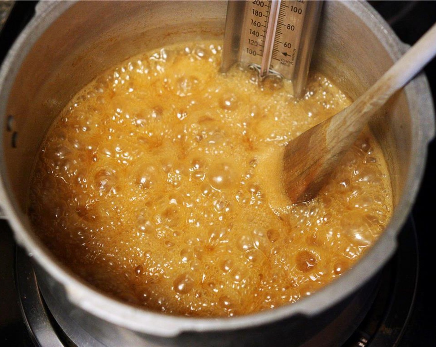 step 5 Once it reaches 300 degrees F (150 degrees C), quickly mix in the Sea Salt Flakes (2 tsp), Ground Cinnamon (1/2 tsp), and Ground Cloves (1/4 tsp). Cook just a bit longer until the mixture reaches 250 degrees F (120 degrees C). Immediately remove the pot from the heat.