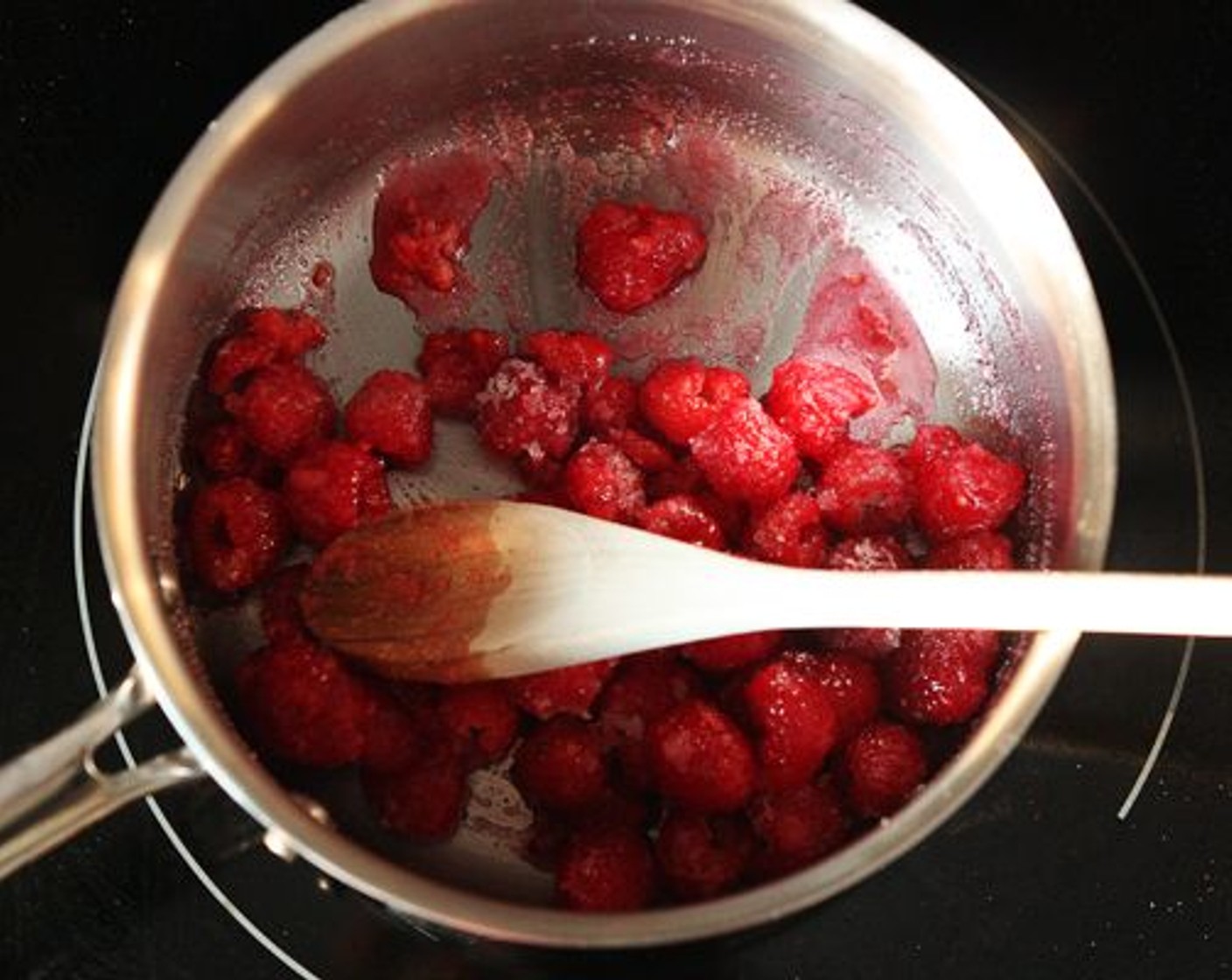 step 11 Combine Fresh Raspberries (1 1/3 cups) and Granulated Sugar (4 Tbsp) in a small saucepan over medium-high heat. Bring to a boil and cook for 8-10 minutes, stirring often to break down the berries.