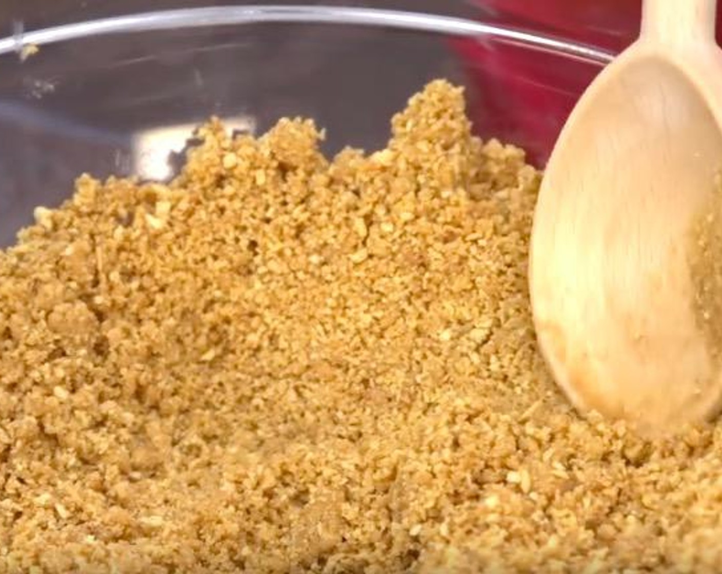 step 1 Put Graham Crackers (3 cups) into the food processor and crush up the cookie. Transfer the cookie crumb into a mixing bowl. Add Butter (3.5 oz) and stir it up until it has the consistency of wet sand.