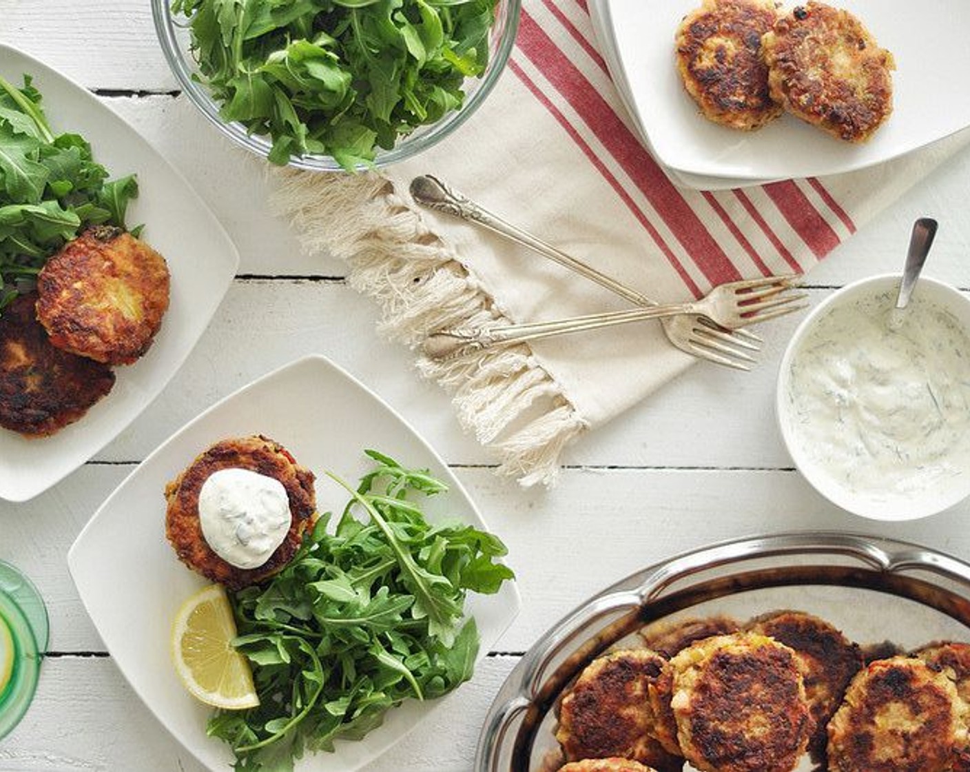 step 14 Serve the cakes with arugula, wedges of Lemons (1 1/2), and creamy dill sauce. The cakes can be made a few days in advance, and store in the fridge. Rewarm in the oven for a few minutes before serving. Enjoy!