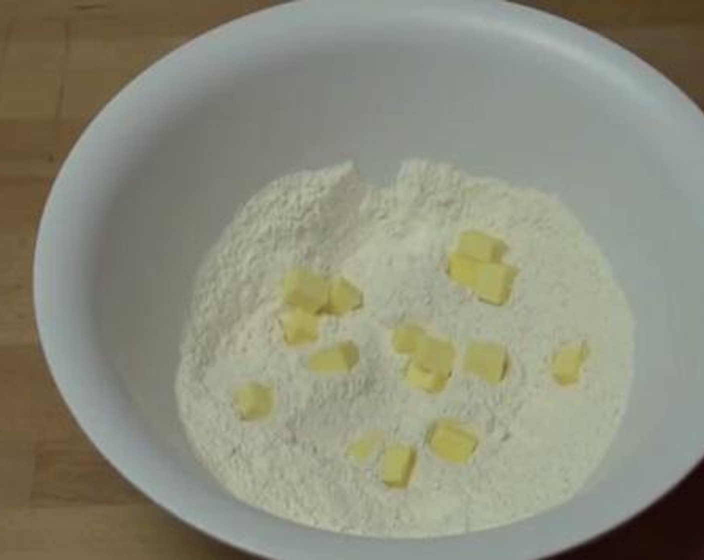 step 1 Inside a bowl, mix together the Self-Rising Flour (3 cups), Salt (1 tsp), Garlic Powder (1 tsp), and Freshly Ground Black Pepper (to taste). Add the Butter (2 oz) and rub together with the flour to combine.