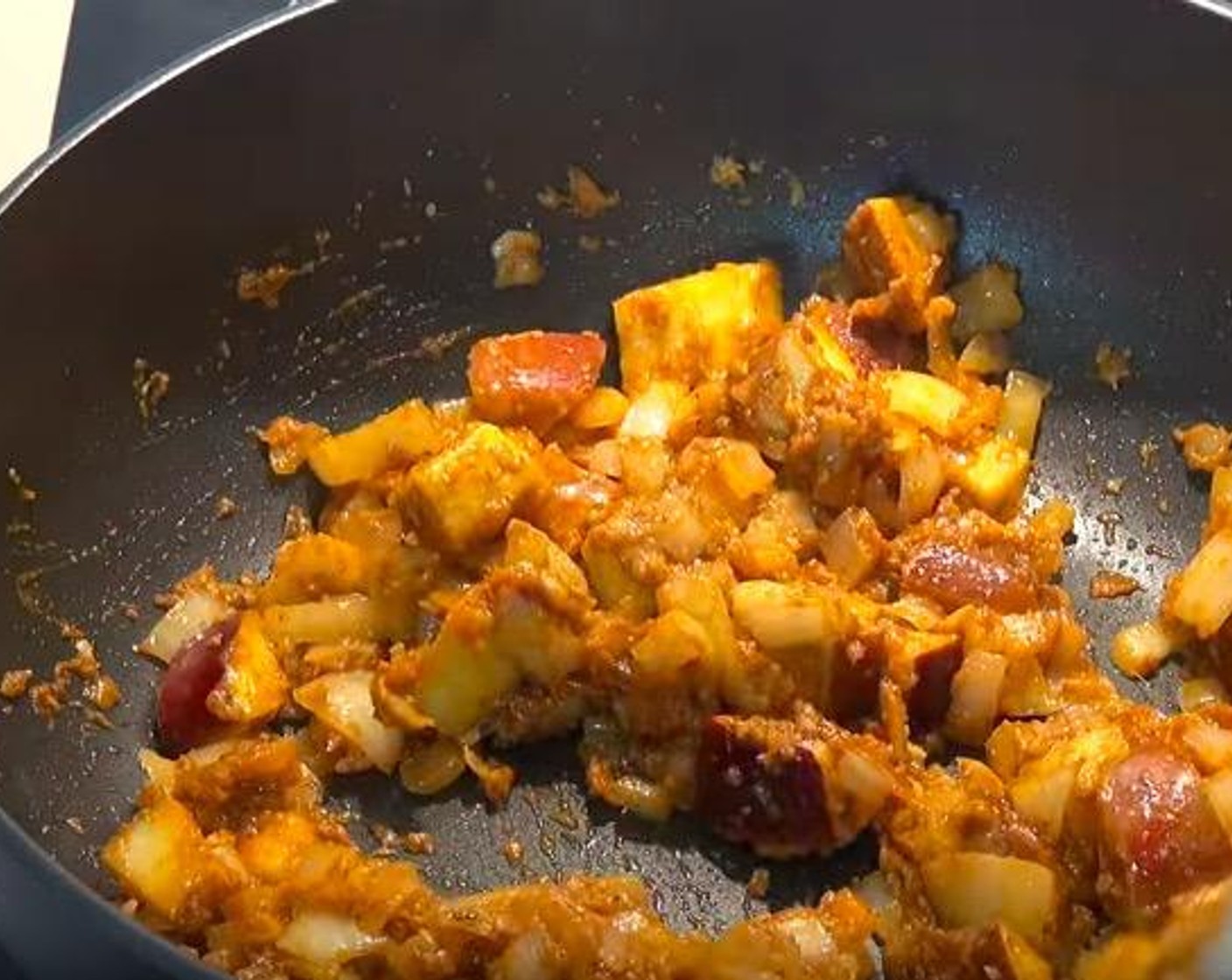 step 2 Add Garlic (2 cloves) and Curry Paste (4 Tbsp). Stir for 2-3 minutes. Season with Salt (to taste) and Ground Black Pepper (to taste).