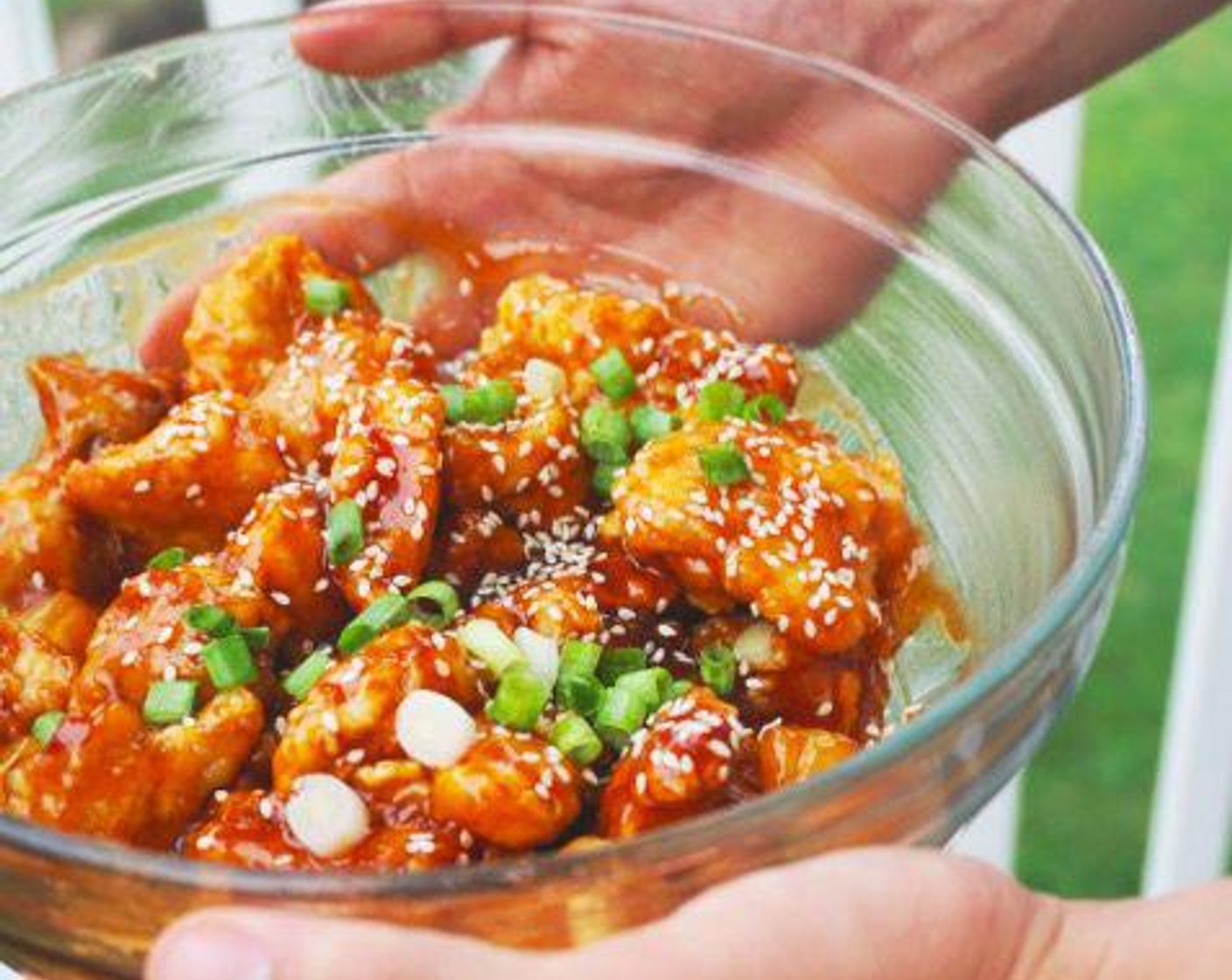 step 6 Transfer chicken to a plate coated with paper towels. Once the sauce is finished, gently combine the sauce and chicken to coat the pieces completely. Sprinkle with Sesame Seeds (to taste) and Scallion (1 handful).
