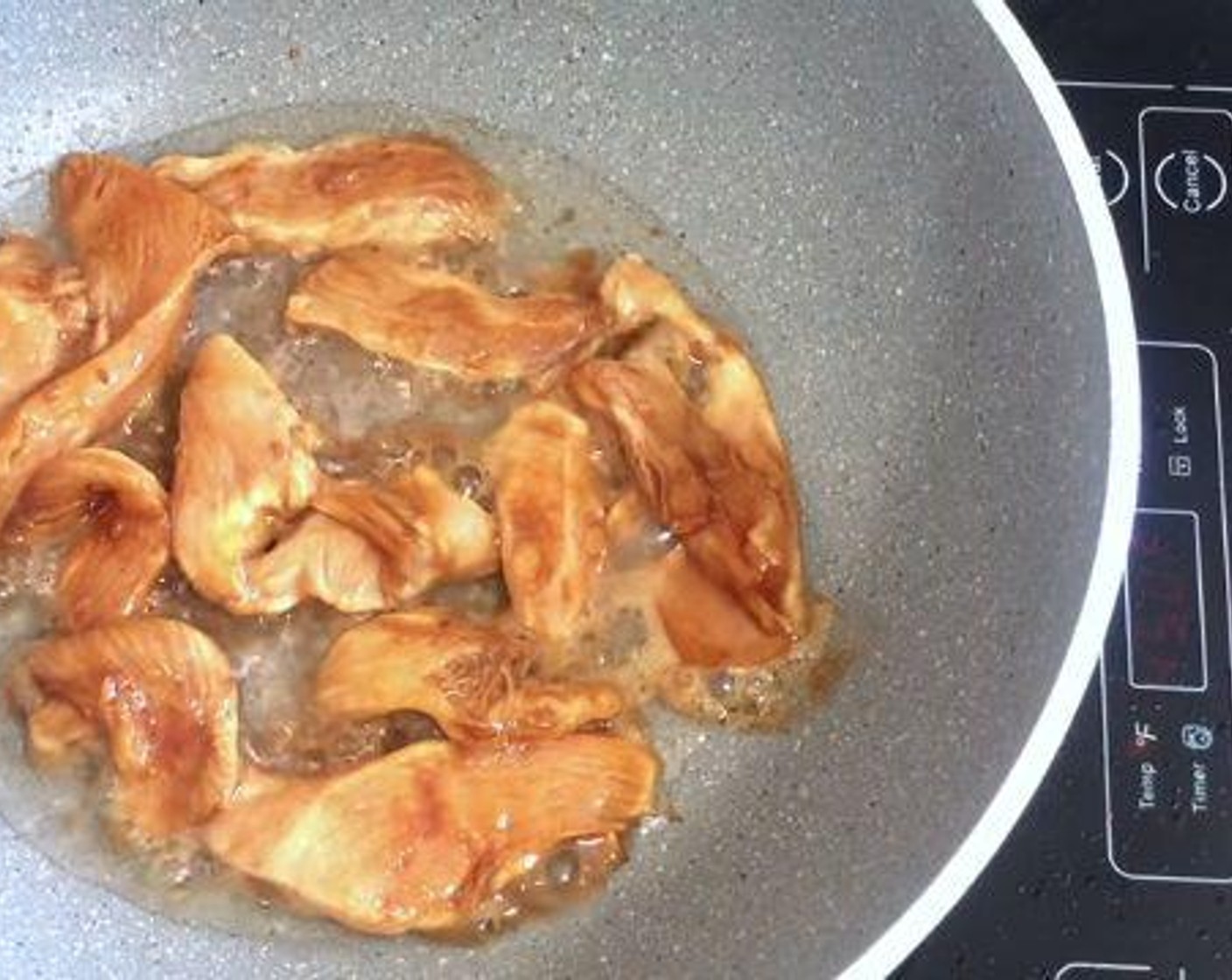 step 2 Add some Vegetable Oil (4 Tbsp) to a cooking pan, and stir fry the chicken pieces for about 4-5 minutes.