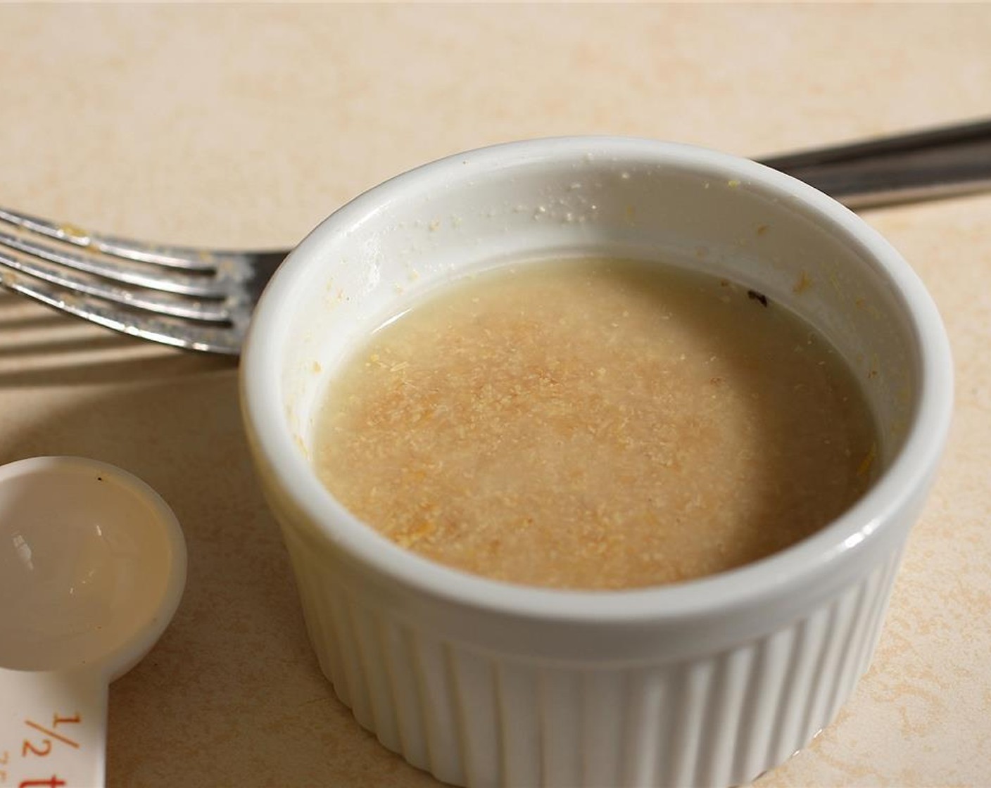 step 2 Make your flax egg by mixing the Ground Flaxseed (2 Tbsp) with Water (4 Tbsp) in a small bowl or ramekin. Place in the fridge to cool for 10-15 minutes.