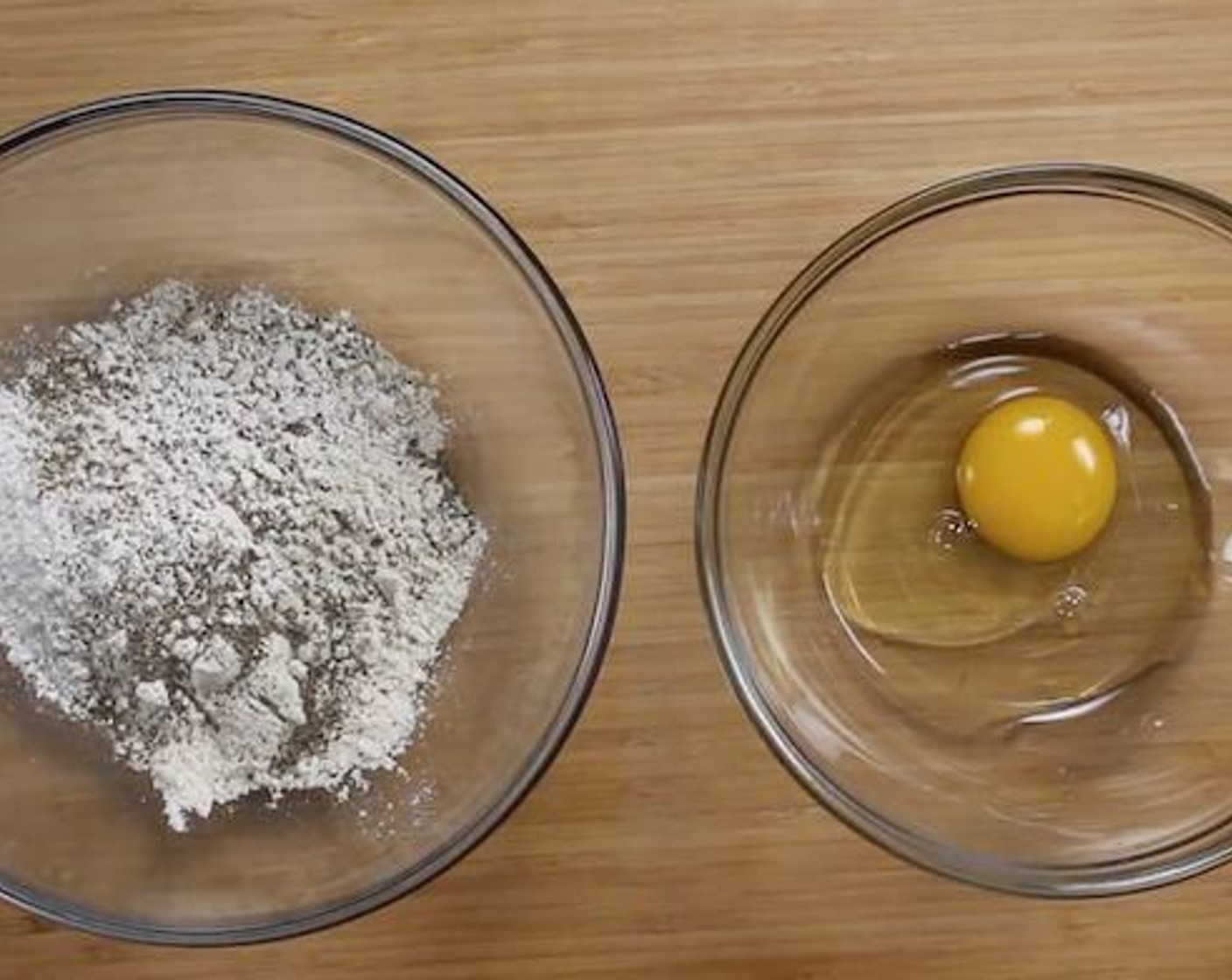 step 3 Place the Egg (1) in one bowl, and in another bowl, mix All-Purpose Flour (4 Tbsp), Corn Flour (1/2 cup), Salt (1/2 tsp) and Ground Black Pepper (1 pinch).