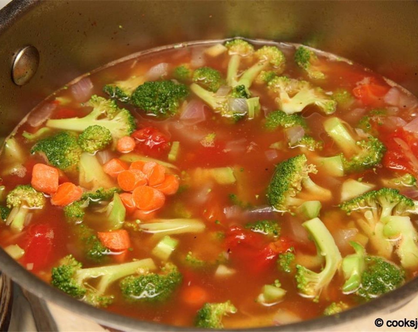 step 4 Then add Broccoli (3 cups) and the Carrots (4 Tbsp) and cook until the pasta is done (follow package instructions).