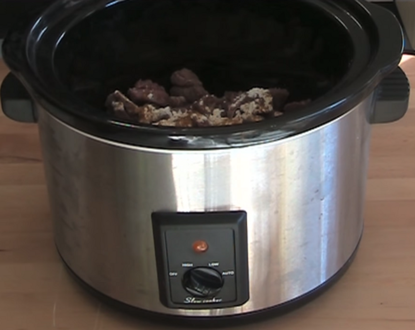 step 1 To the slow cooker, add Beef (2.2 lb), All-Purpose Flour (1/2 cup), and Curry Powder (1 Tbsp). Stir together. Add Garlic (2 cloves), Sultanas (1 cup), Onions (2), Green Apples (2),