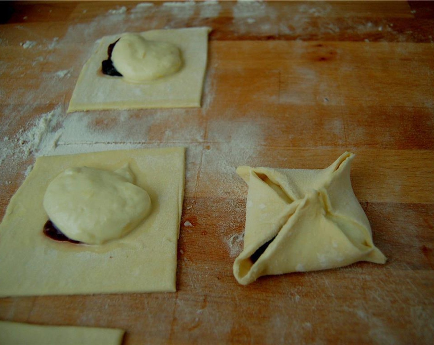 step 6 Bring the corners together and pinch the corners to seal.