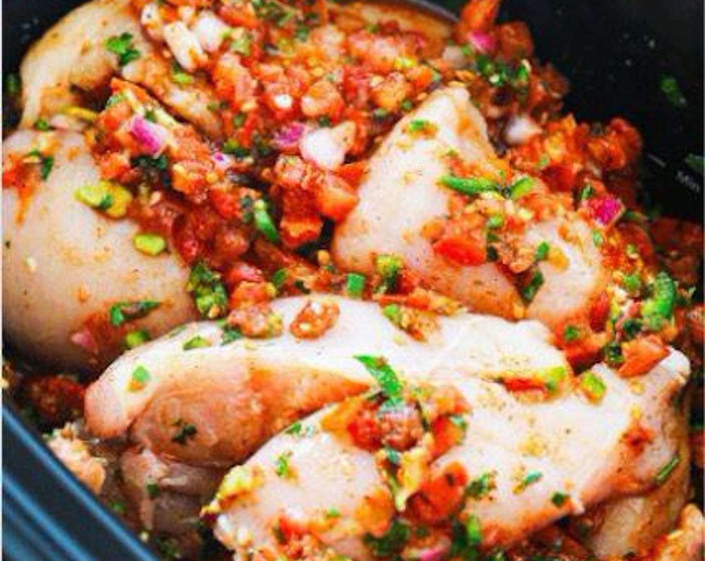 step 1 In a slow cooker, mix together the Medium Salsa (2 2/3 cups), Lime (1), Fresh Cilantro (4 Tbsp), Taco Seasoning (1/4 cup) and Jalapeño Peppers (2). Add the Boneless, Skinless Chicken Breasts (6) and coat with the salsa mixture.