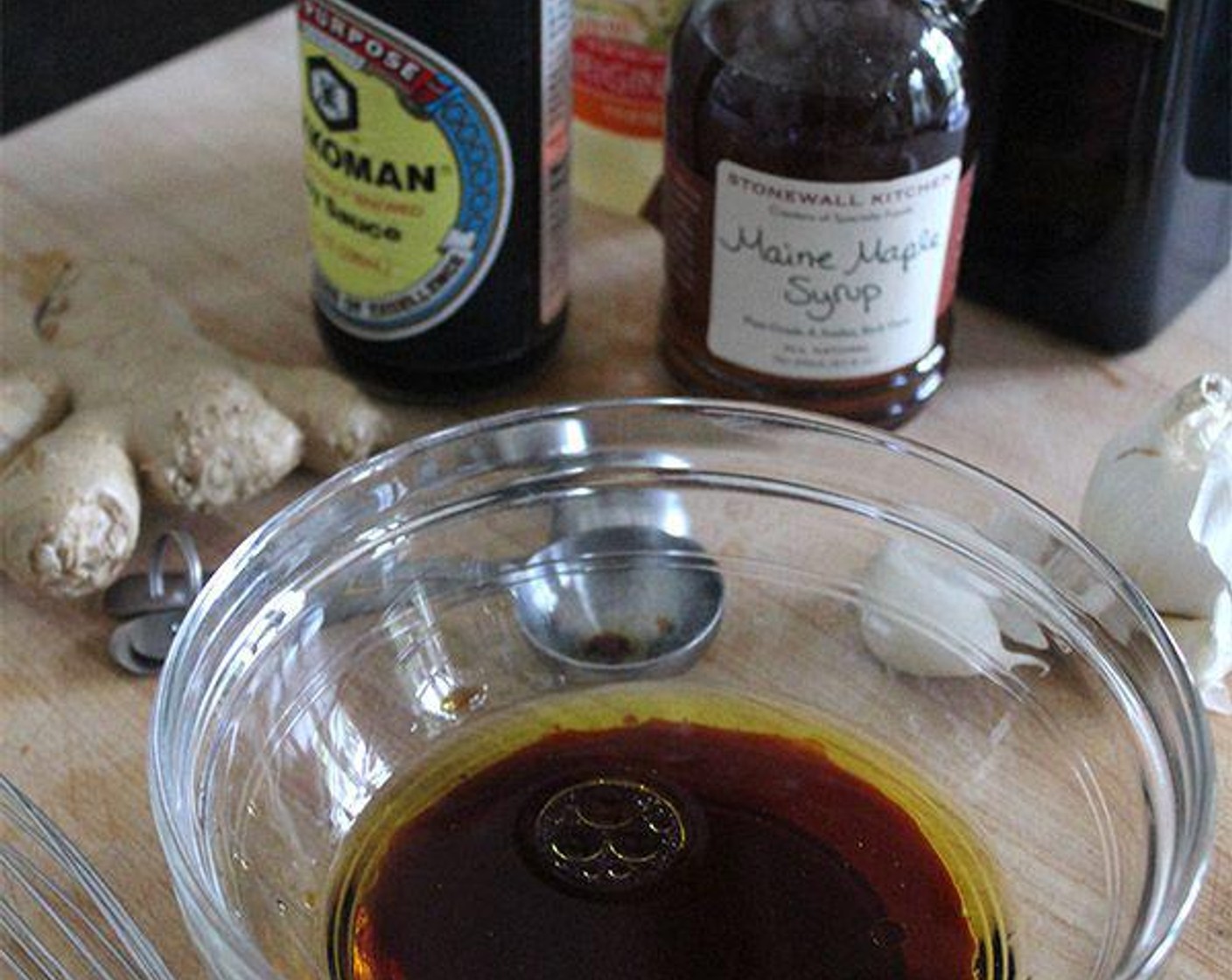 step 1 In a small bowl, whisk together the Pure Maple Syrup (2 Tbsp), Fresh Ginger (2 tsp), Garlic (2 cloves), Soy Sauce (2 Tbsp), Rice Vinegar (2 tsp), and about 3 tablespoons Extra-Virgin Olive Oil (as needed). Set aside.