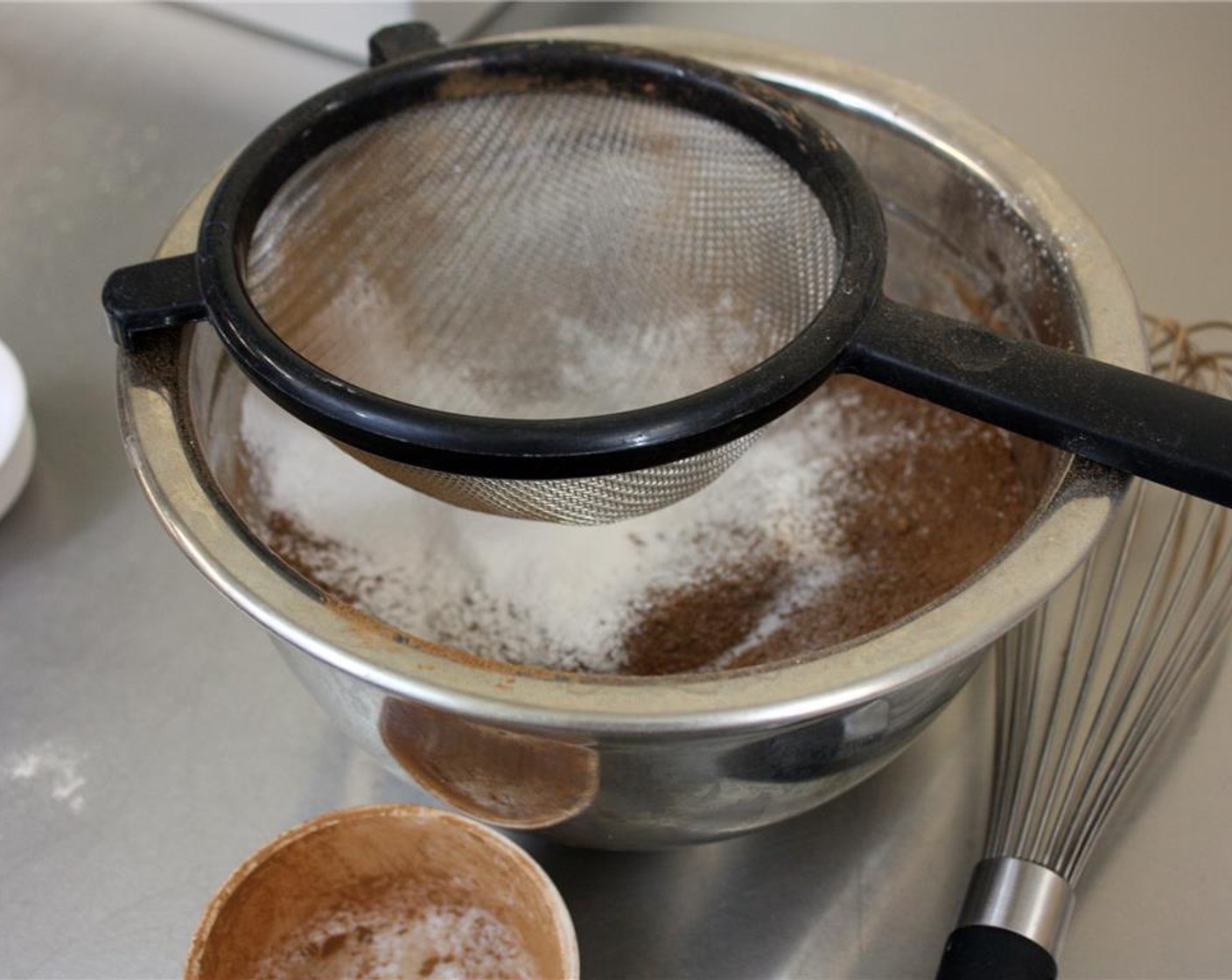 step 4 Sift the Brown Rice Flour (3/4 cup), Arrowroot (2 Tbsp), Unsweetened Cocoa Powder (4 Tbsp), Salt (1/2 tsp), and Baking Soda (1/4 tsp) into the same mixing bowl as the almonds. Whisk well to combine, set aside.