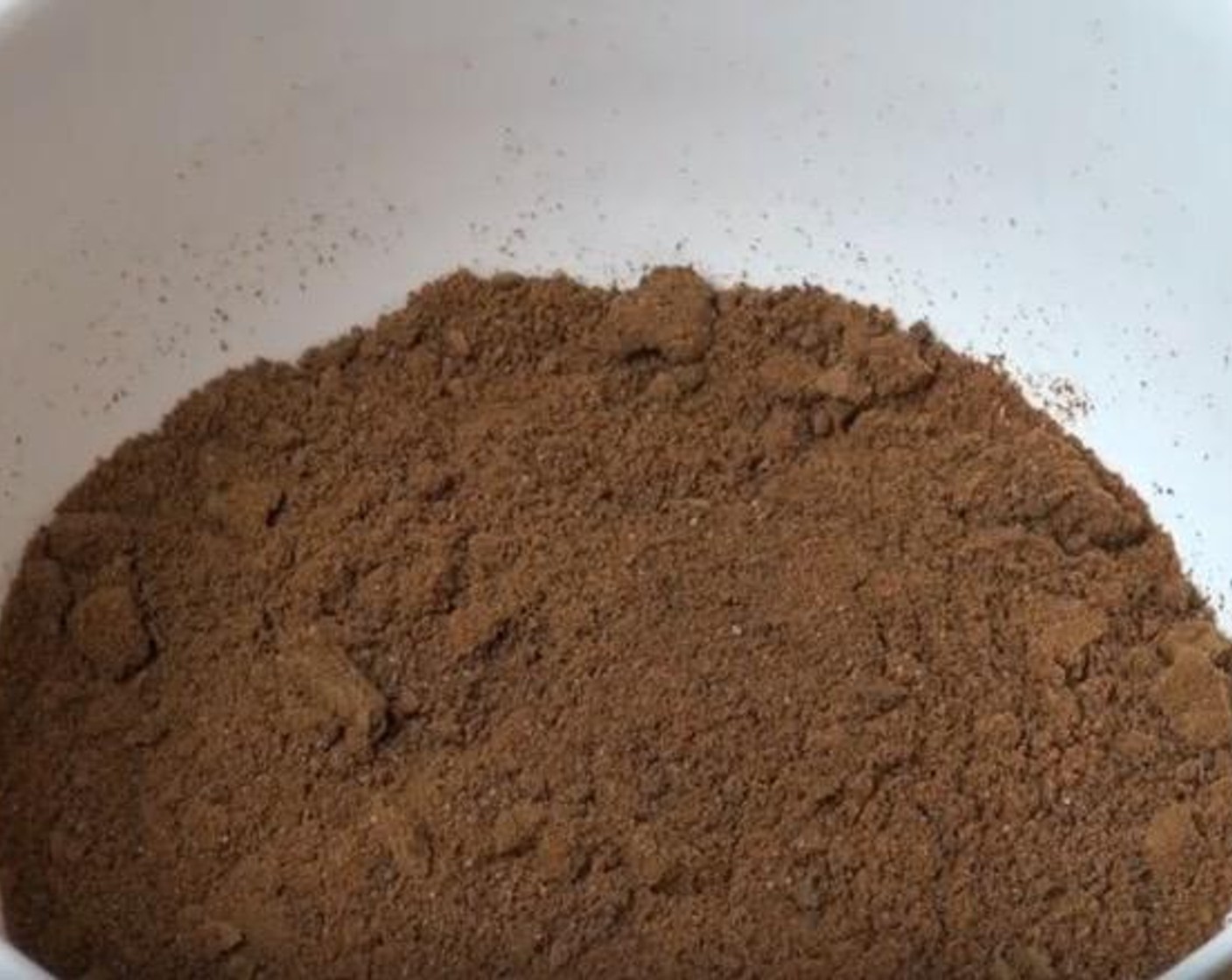 step 3 In a mixing bowl, add Chocolate Biscuits (2 cups) and Butter (3.5 oz). Stir together until mixture has the appearance of wet sand.