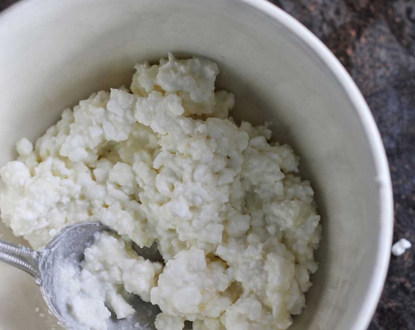 step 7 For the filling, mix together Cottage Cheese (3/4 cup) and Grated Parmesan Cheese (4 Tbsp).