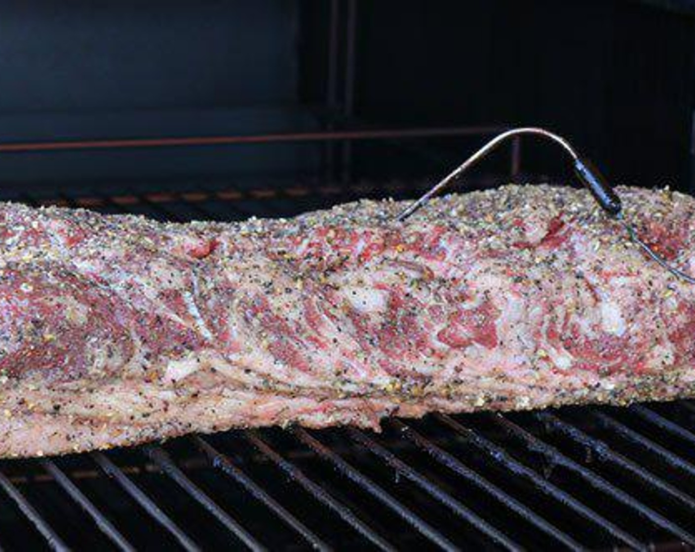 step 3 Set smoker at 250 degrees F (120 degrees C). Throw on just 2 chunks of Hickory before the Strip Loin goes on the pit. You can use any type of smoker for this cook and don’t add too much wood. Let strip loin cook for 2 hours at a constant 250 degrees F (120 degrees C).