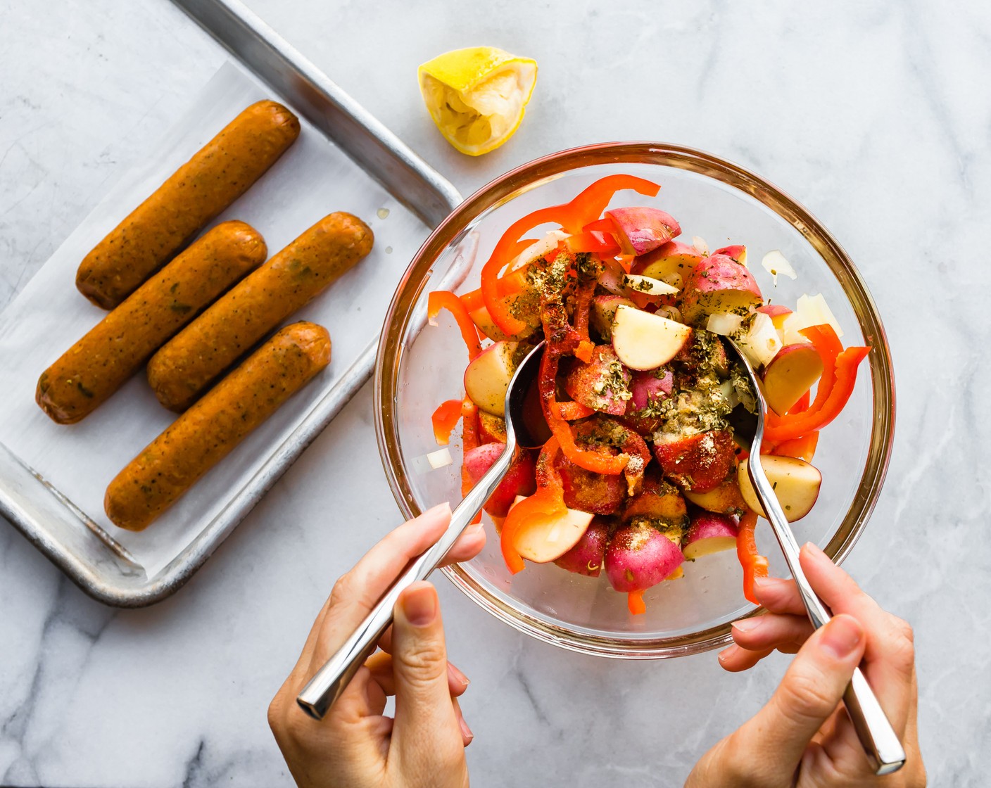 step 2 Place Red Potatoes (3 cups), Bell Pepper (1), and Yellow Onion (1) in a large bowl or Ziploc bag. Add the Olive Oil (2 Tbsp), Smoked Paprika (1/2 tsp), Italian Seasoning (1 tsp), Garlic Powder (1 tsp), and juice from Lemon (1). Toss until veggies are thoroughly coated.