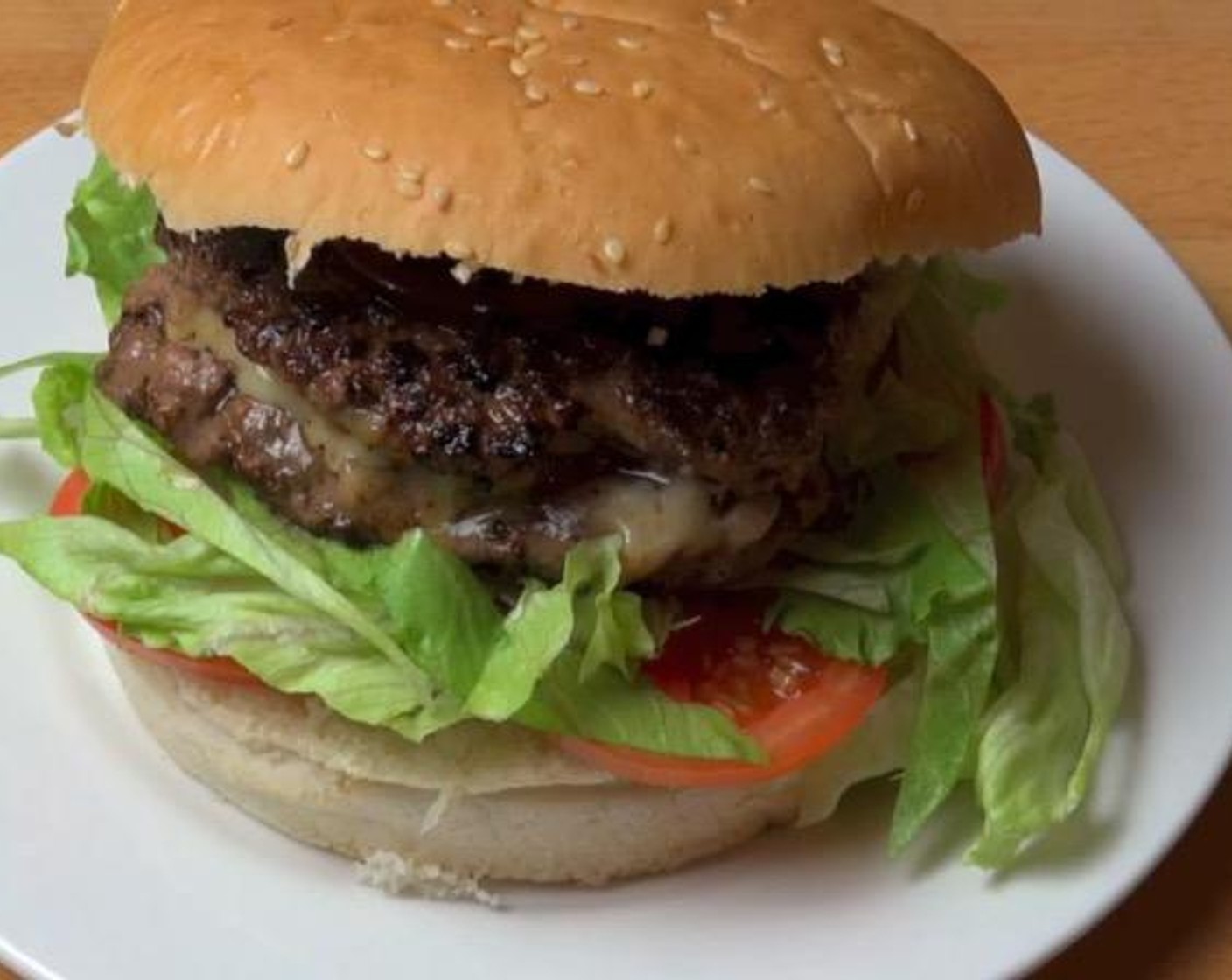 step 5 Top Hamburger Buns (4) with Olive Oil (to taste), Tomatoes (to taste), Lettuce (to taste), and a patty. Serve and enjoy!
