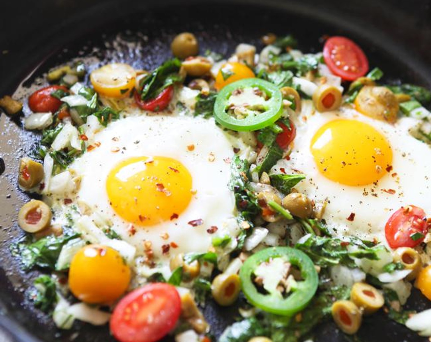 step 3 Add Turkey (to taste), if using. Create two holes in the center of the veggies and crack a Large Eggs (14) into each hole. Cover with a lid or baking sheet and let sit for 4-5 minutes, or until whites of eggs are cooked through.