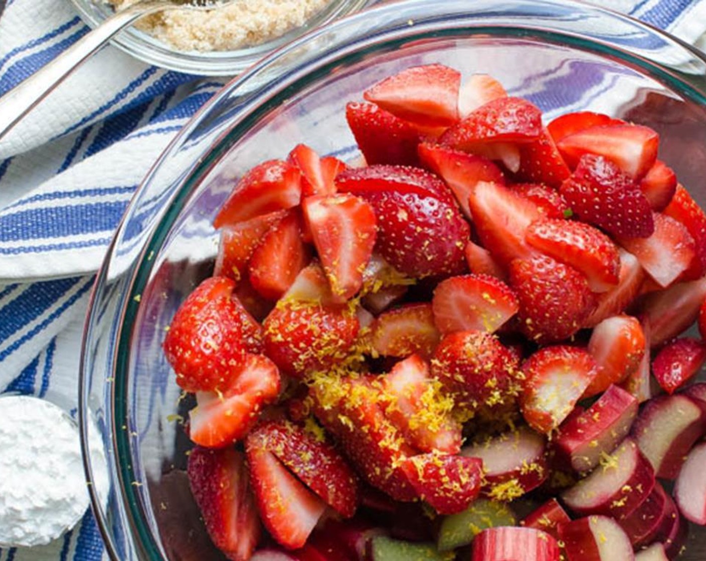 step 2 In a large bowl, combine the Rhubarb (1.5 lb), Fresh Strawberries (4 cups), Brown Sugar (4 Tbsp), Granulated Sugar (4 Tbsp), Arrowroot Starch (4 Tbsp), Salt (1/4 tsp), and zest and juice from Lemon (1). Toss to combine.