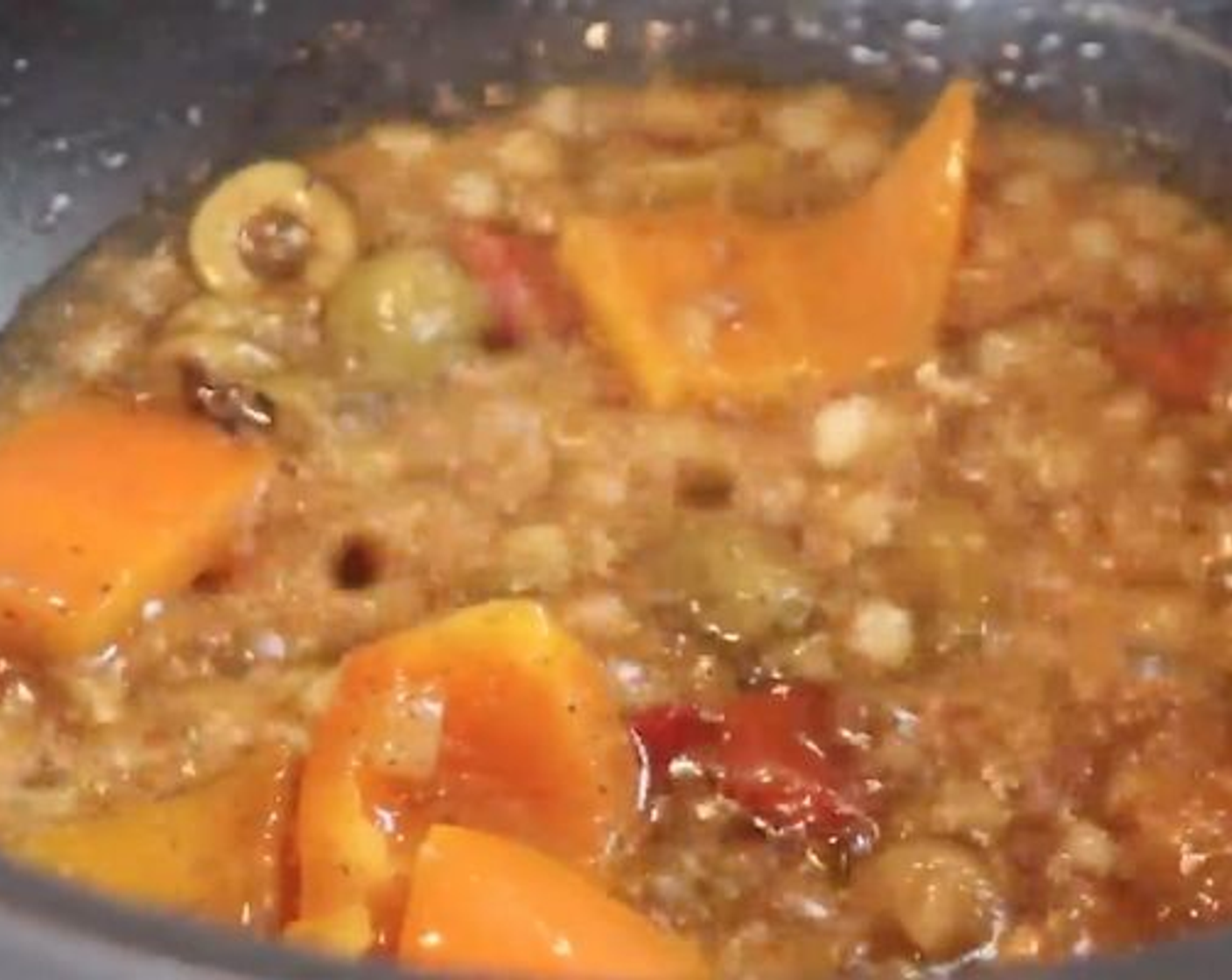 step 5 Once simmering add Tomato Sauce (4 Tbsp), stir, and then add the Pinto Beans (1 can). Add Water (4 1/2 cups), Fresh Cilantro (to taste), and stir again. Now cover and bring to a boil.