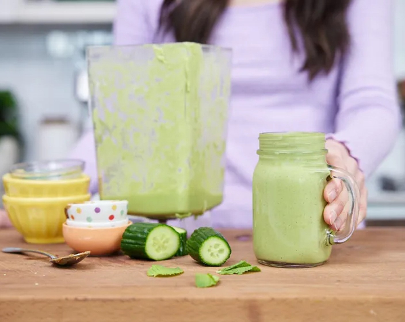 step 1 Place the Frozen Pineapple (1 cup), Avocado (1/2), Leafy Greens (1 cup), Celery (2 stalks), Cucumber (1/2), Nut Butter (1 Tbsp), Hemp Hearts (4 Tbsp), Ground Flaxseed (1 Tbsp), Fresh Mint Leaves (3), Ground Cinnamon (1/2 tsp), Raw Honey (1 Tbsp), and Non-Dairy Milk (to taste) into a blender and blitz until smooth and creamy.