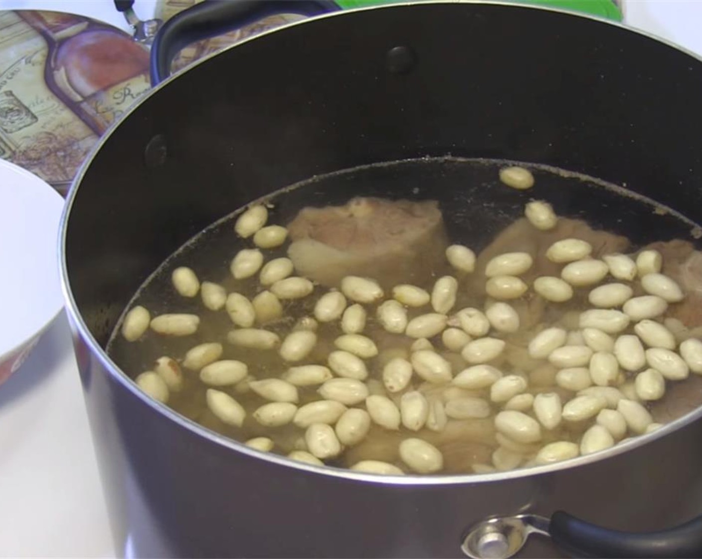 step 3 Finally, add in the Raw Peanuts (2 1/3 cups), then let simmer for 3 hours. If you want to add some vegetables, add them 10-15 minutes before you are ready to serve to the soup.