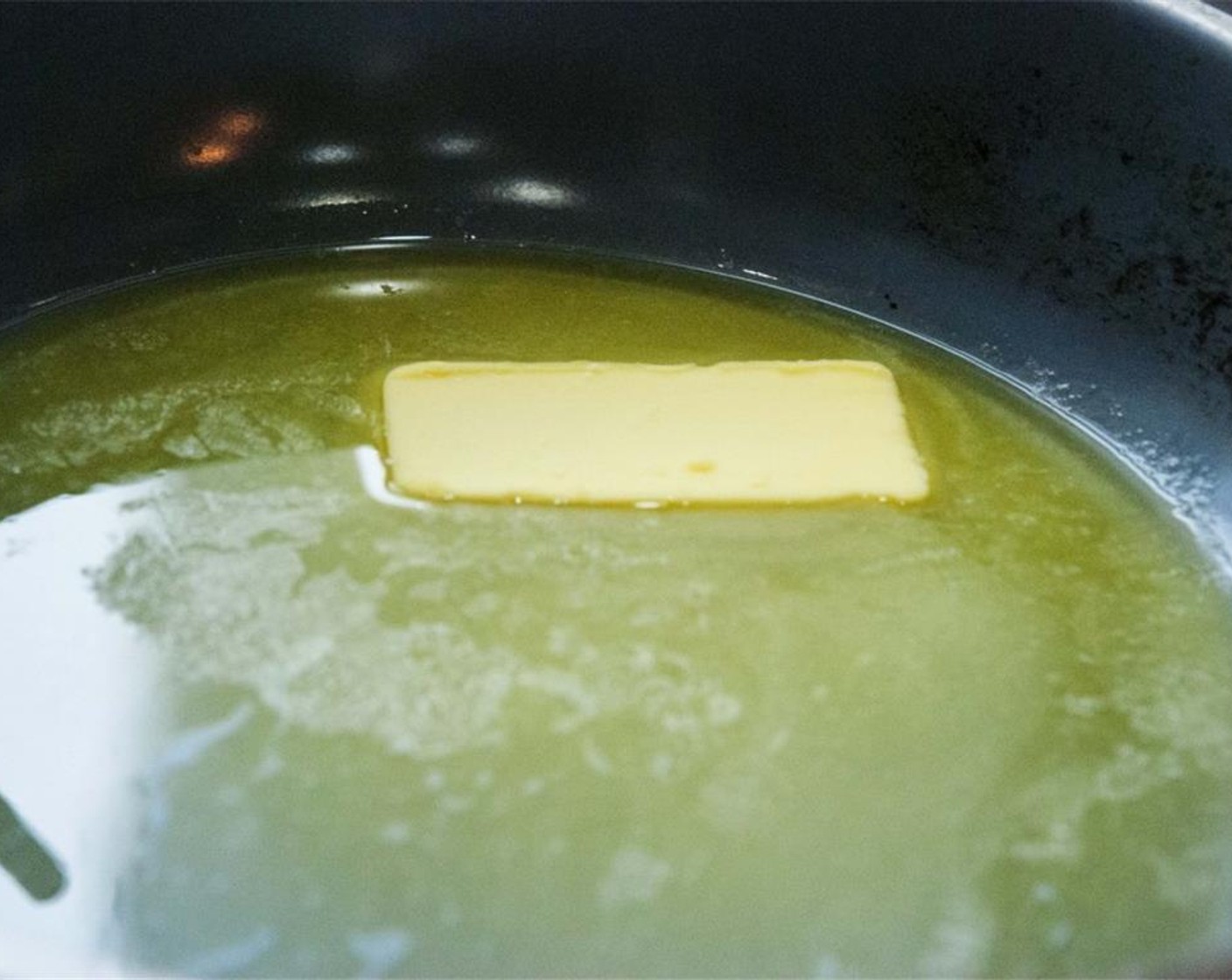 step 2 In a skillet, melt the Butter (2 Tbsp) and slowly add the Granulated Sugar (2 1/3 Tbsp). Stir until the sugar is all dissolved.