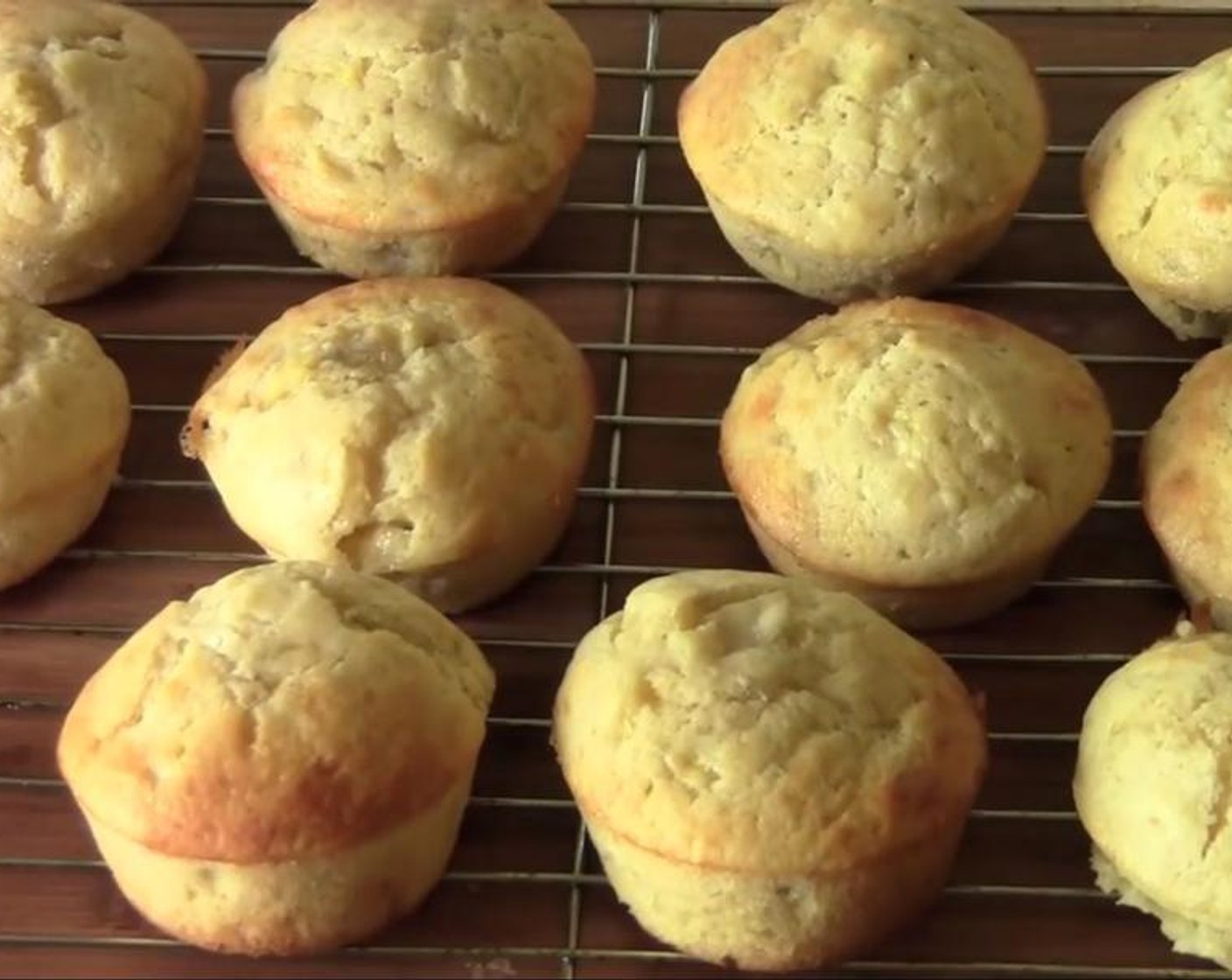step 3 Use butter to grease the holes in the muffin pan. Put a quarter cup of the mixture into each hole. Put the tray into the oven preheated to 225 degrees C (440 degrees F) for 12 minutes. When done, let them cool for a few minutes, and serve.