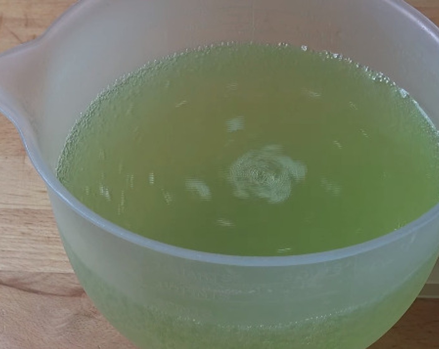 step 2 In a jug, pour the Sprite (4 cups) and the jello mixture. Stir again with a spoon. Cool in the fridge for 2-3 hours.