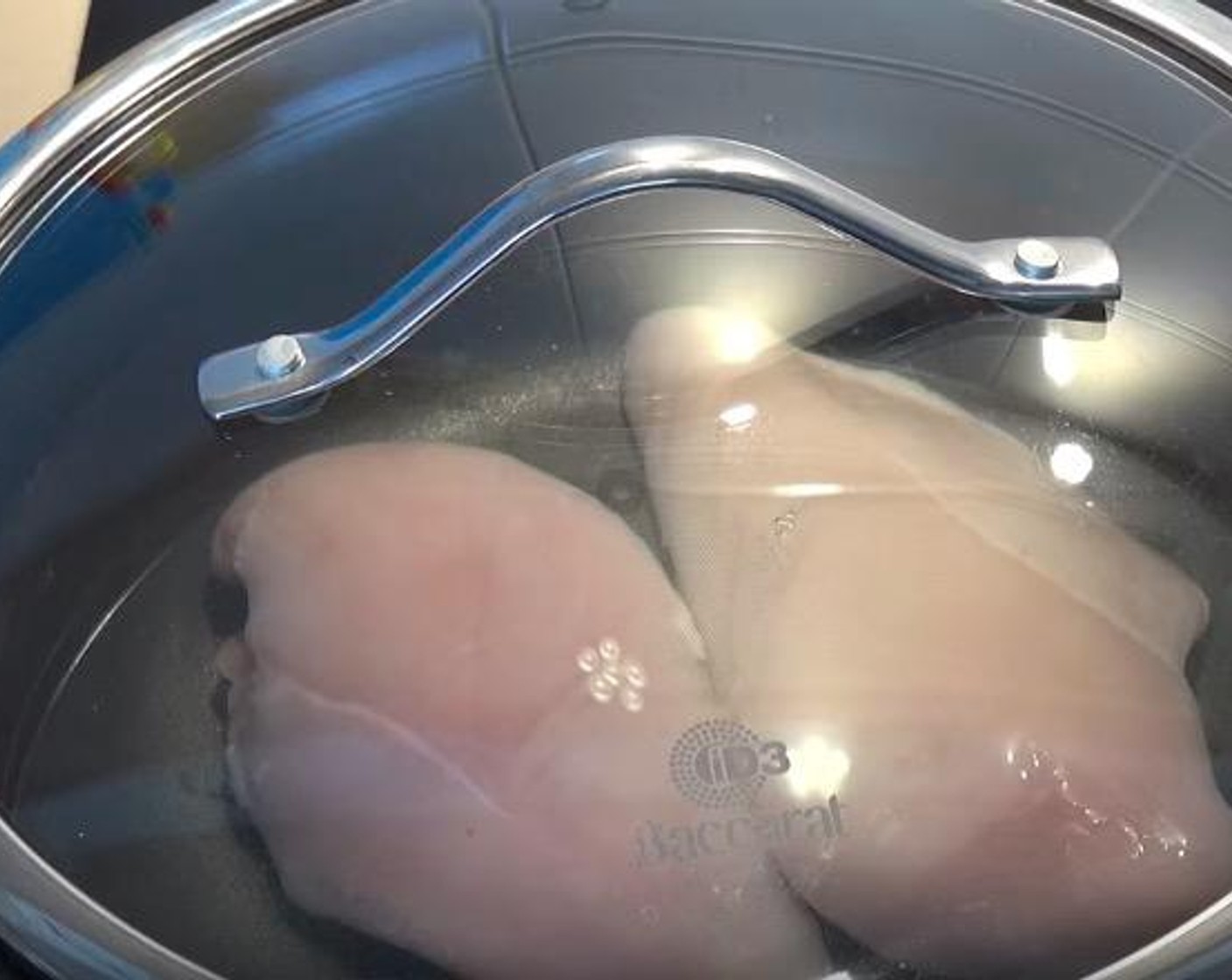step 1 In a saucepan, add Chicken Breasts (2) and cover with water. Cover and cook on medium heat until it starts to simmer. Simmer for 10 minutes, or until chicken is cooked through.