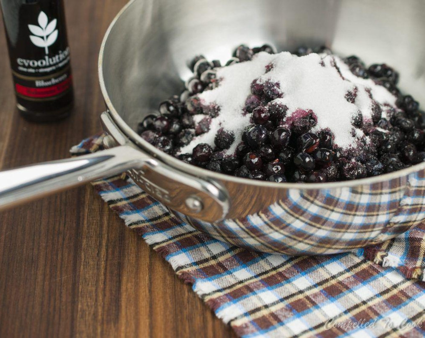 step 1 In a medium sauce pan combine Frozen Blueberries (2 cups), Granulated Sugar (1/2 cup), and Water (4 Tbsp).