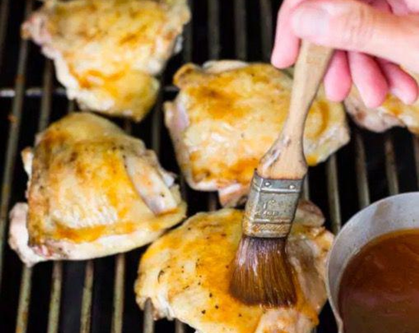 step 3 Preheat grill to 350 degrees F (180 degrees C). Grill the chicken 5 minutes on one side, brushing liberally with the BBQ marinade every few minutes.