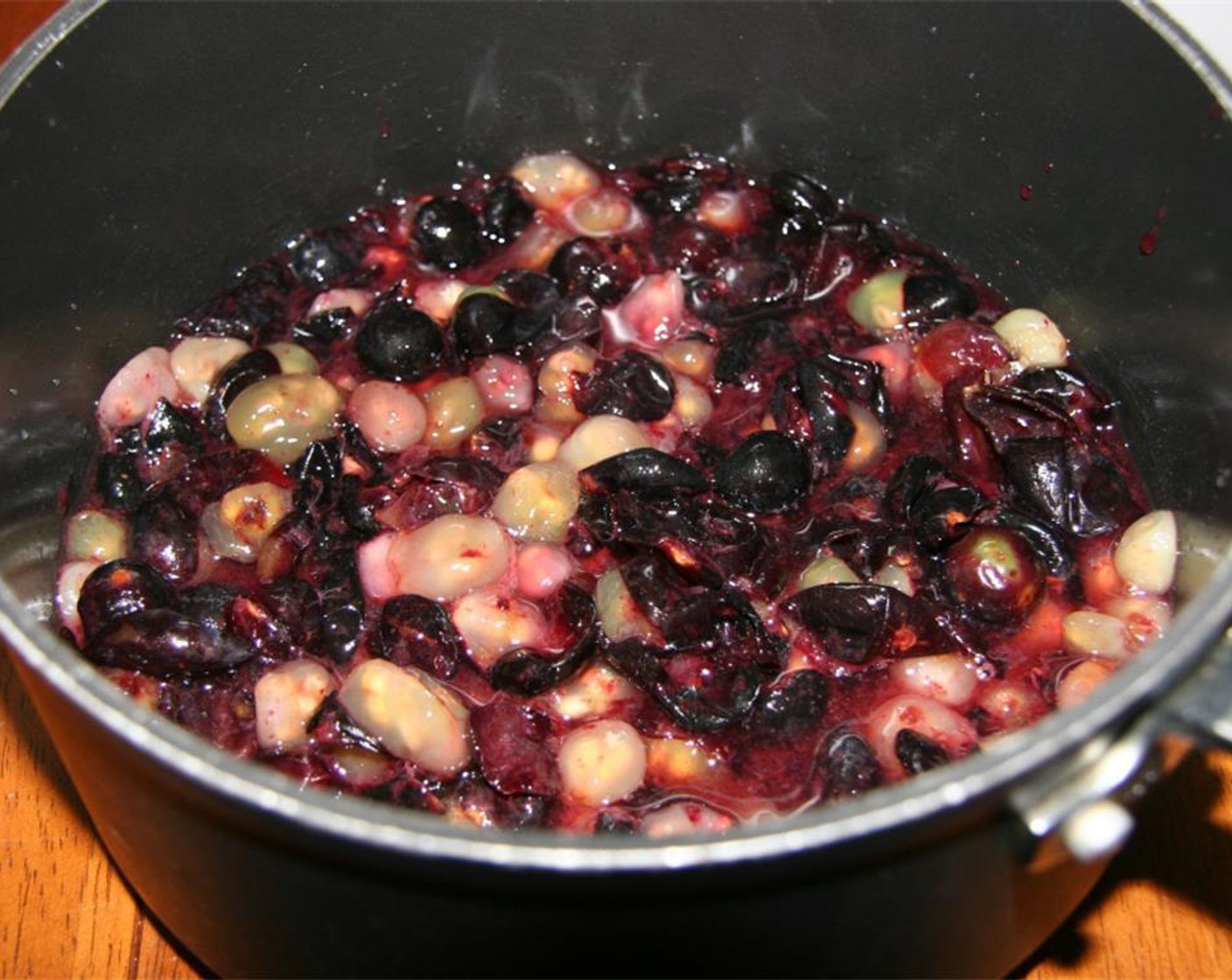 step 2 Place in a saucepan and crush with a potato masher.  Add Water (4 Tbsp), cover and cook on medium heat for 15 minutes.
