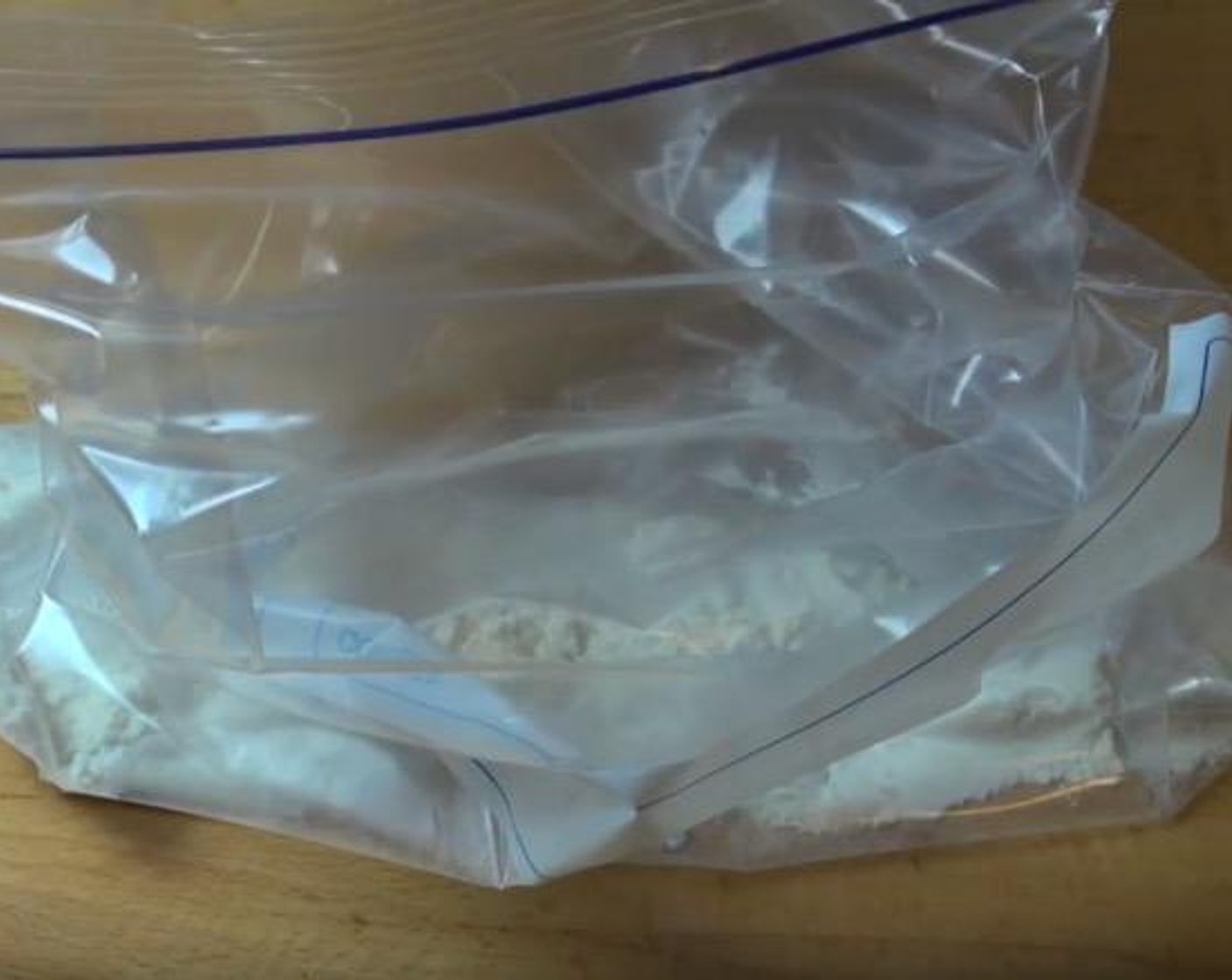 step 1 In a large Ziploc bag, add All-Purpose Flour (1/2 cup), Garlic Powder (1 tsp), Smoked Paprika (1 tsp), Chili Powder (1/2 tsp), Cayenne Pepper (1/2 tsp), Salt (to taste), Ground Black Pepper (to taste). Seal the bag and shake up the mixture.