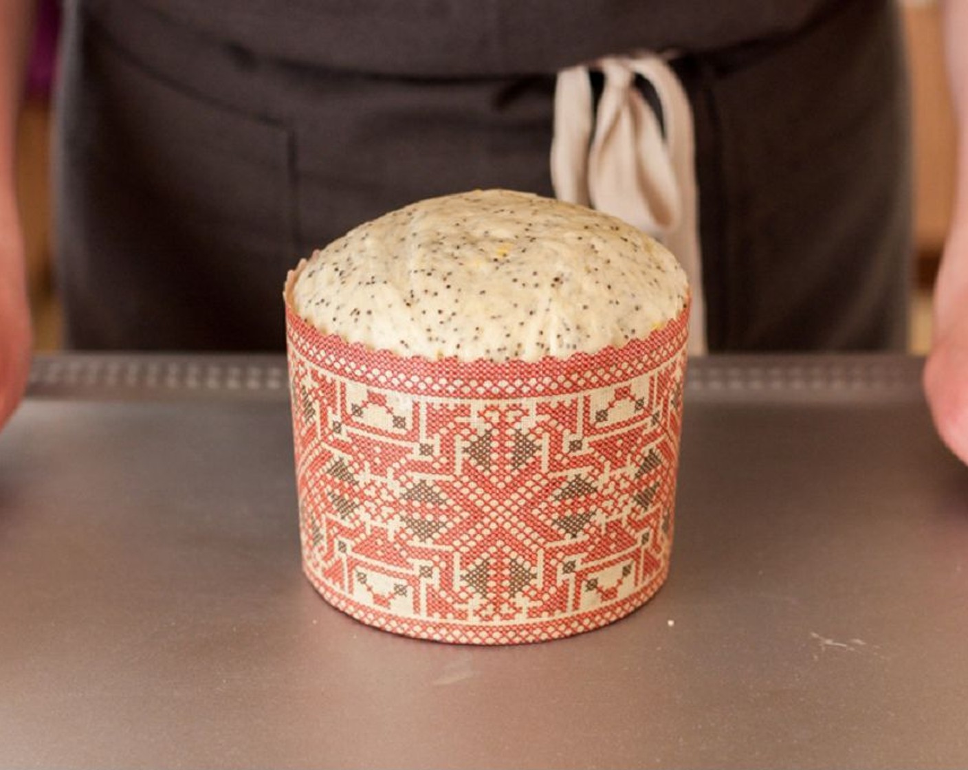 step 8 Bake for 30–35 minutes. Place it in the center of the oven. You’ll know that the bread is done when its top is golden brown. Let the breads cool in the pans for 10 minutes, then transfer to a rack to cool completely before glazing and before tearing off the wrapper.