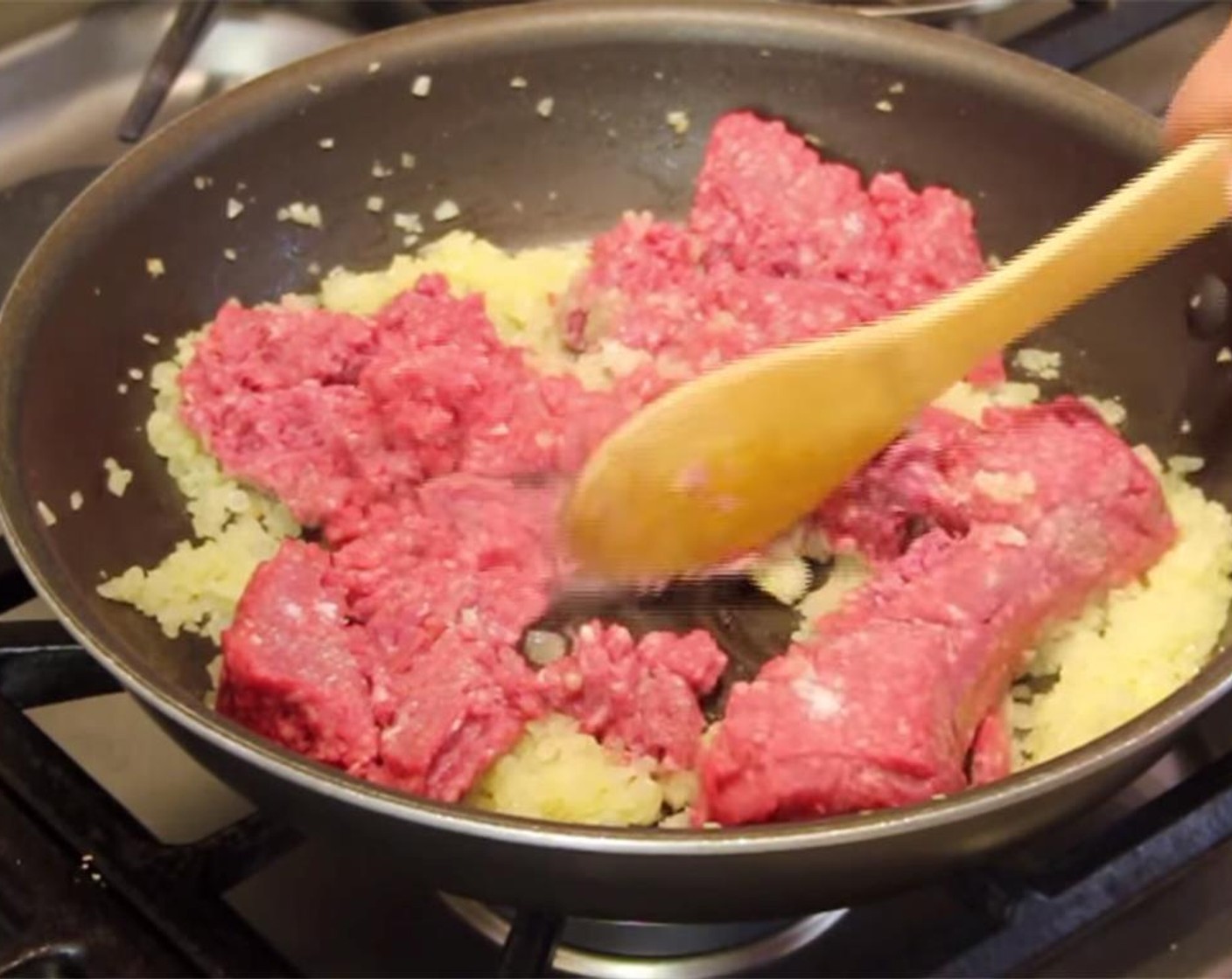 step 3 Add Ground Beef (1.5 lb) and Salt (1 tsp). Cook over medium heat, breaking up beef and stirring, until completely browned.