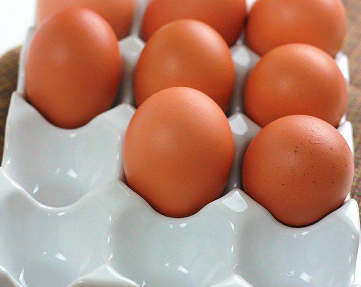 step 6 Crack the first Large Eggs (4) into a small measuring cup with a handle. If you choose, add Rice Vinegar (2 tsp) to water.