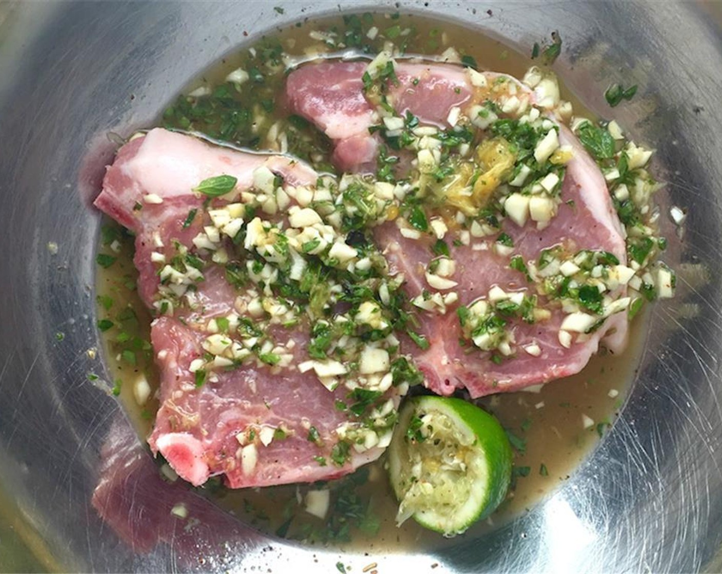 step 2 Marinate the Center-Cut Pork Chops (4) (pork chops should be about 1-inch thick) in the mojo for at least an hour or two and up to overnight.