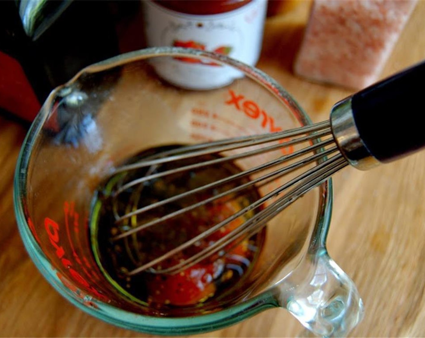 step 4 Add the Olive Oil (4 Tbsp), Balsamic Vinegar (4 Tbsp), and salt and pepper (to taste), then whisk until well combined.