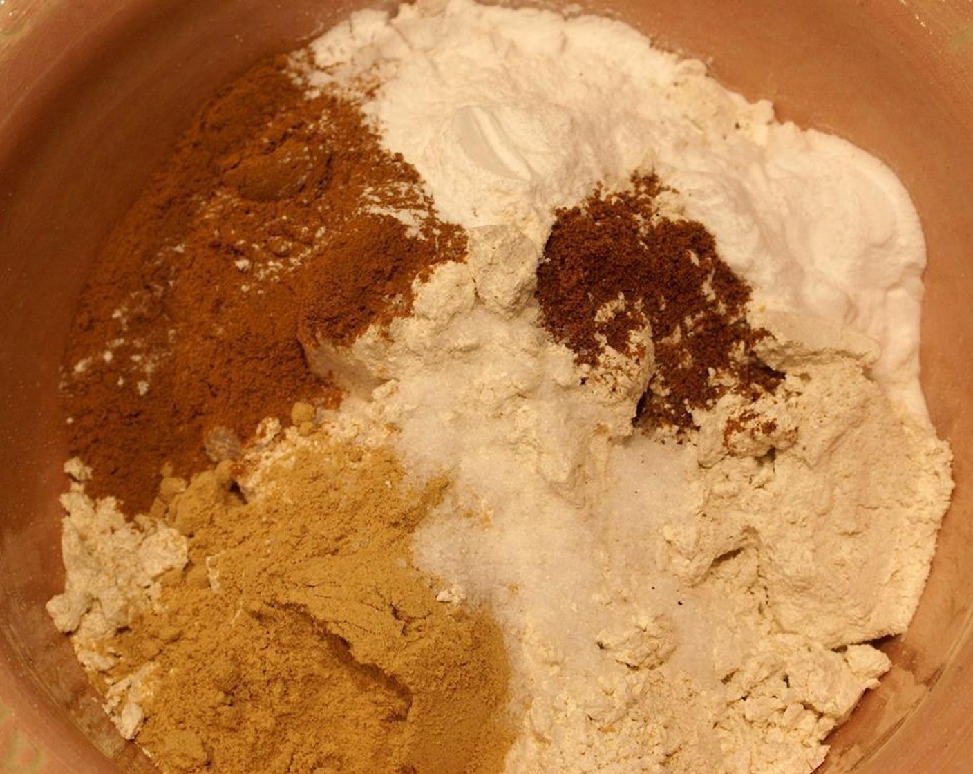 step 3 Whisk Whole Wheat Pastry Flour (2 cups), Baking Powder (2 tsp), Baking Soda (2 tsp), Ground Ginger (2 Tbsp), Ground Cinnamon (1 Tbsp), Ground Nutmeg (1/4 tsp), and Salt (1 tsp) together in a bowl. Add in Vanilla Extract (1 Tbsp).