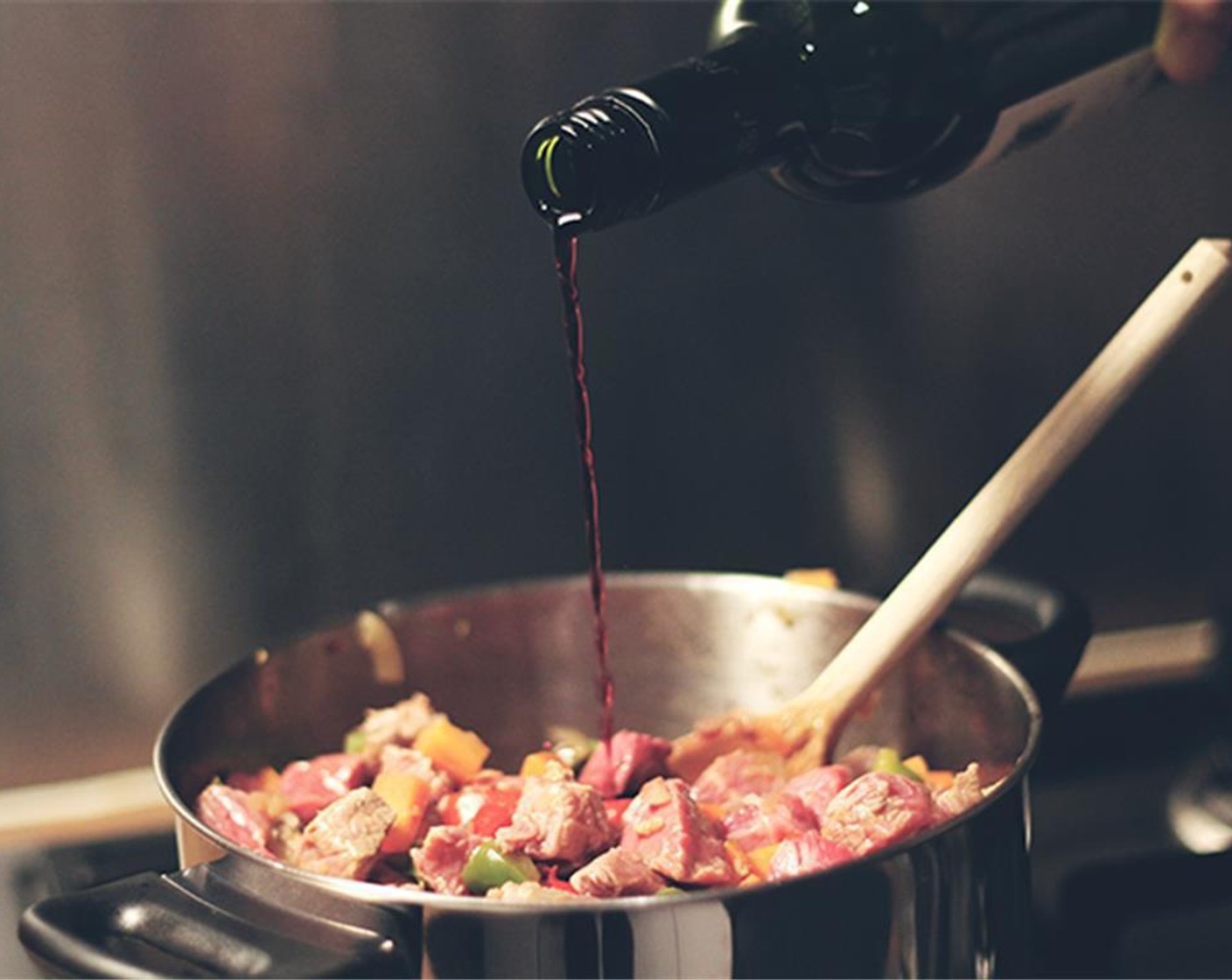 step 5 Add Paprika (2 Tbsp) and All-Purpose Flour (1 Tbsp) to the pot. Add Crushed Tomatoes (2 cans) and let simmer for around 45 minutes, stirring every now and then. Towards the end of the 45 minutes, stir in the Red Wine (1/3 cup).