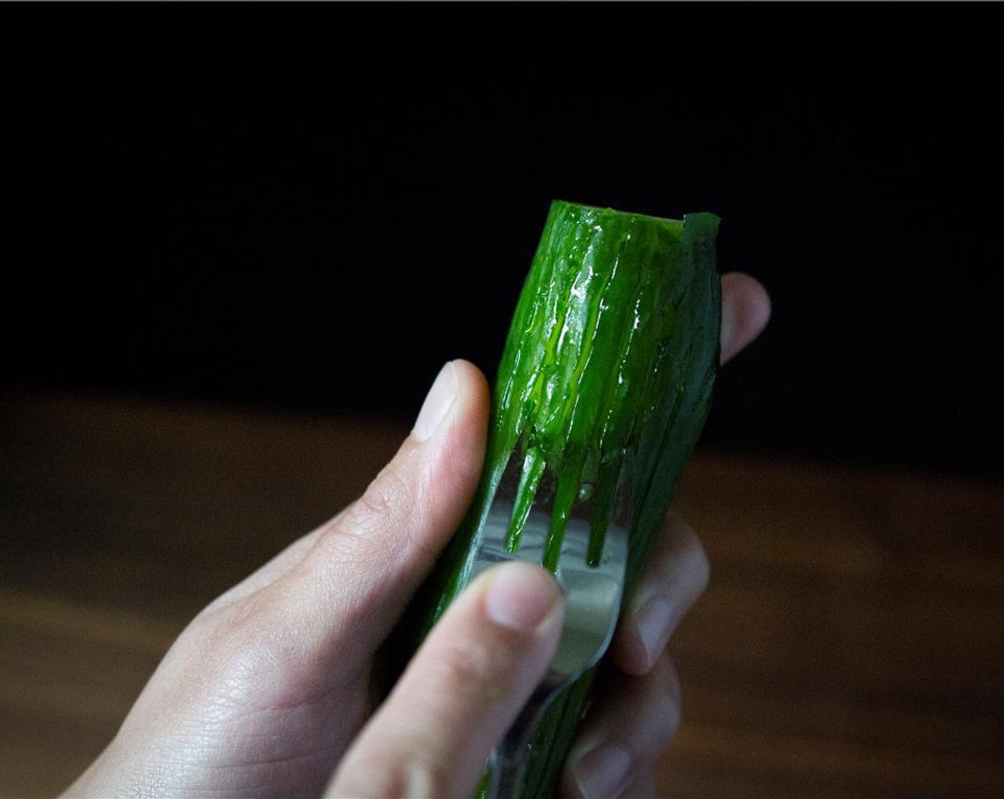 step 1 Vertically score the sides of the English Cucumber (1).