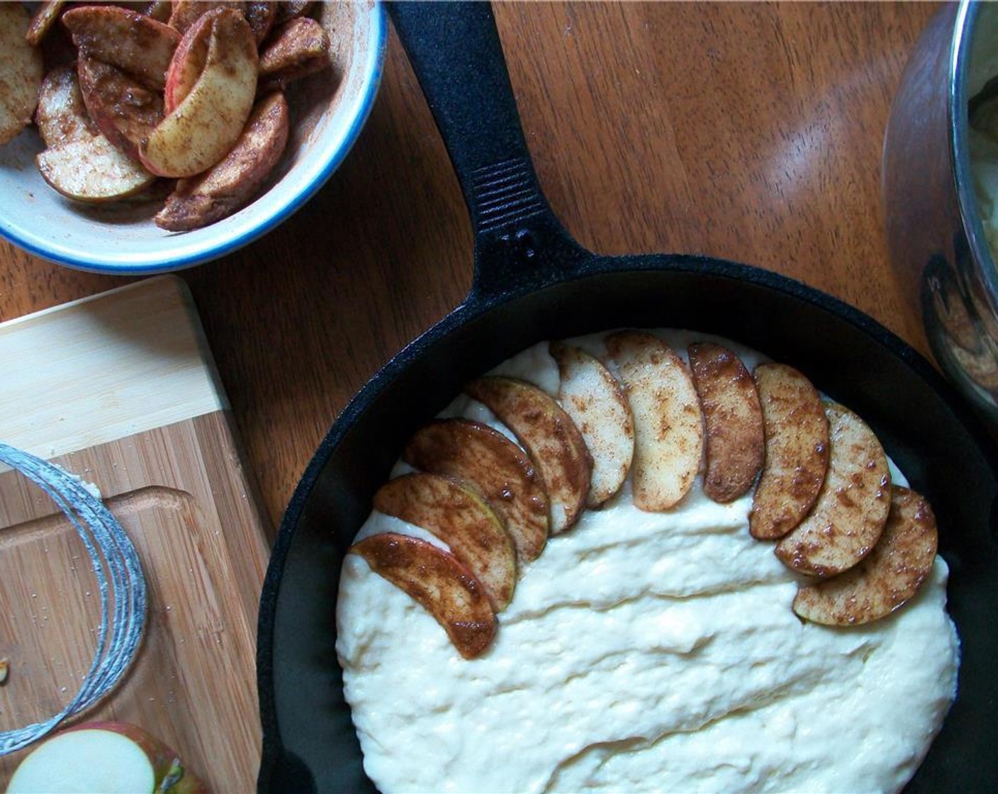 step 5 Arrange apples on top of batter and spread remaining batter carefully over the top.