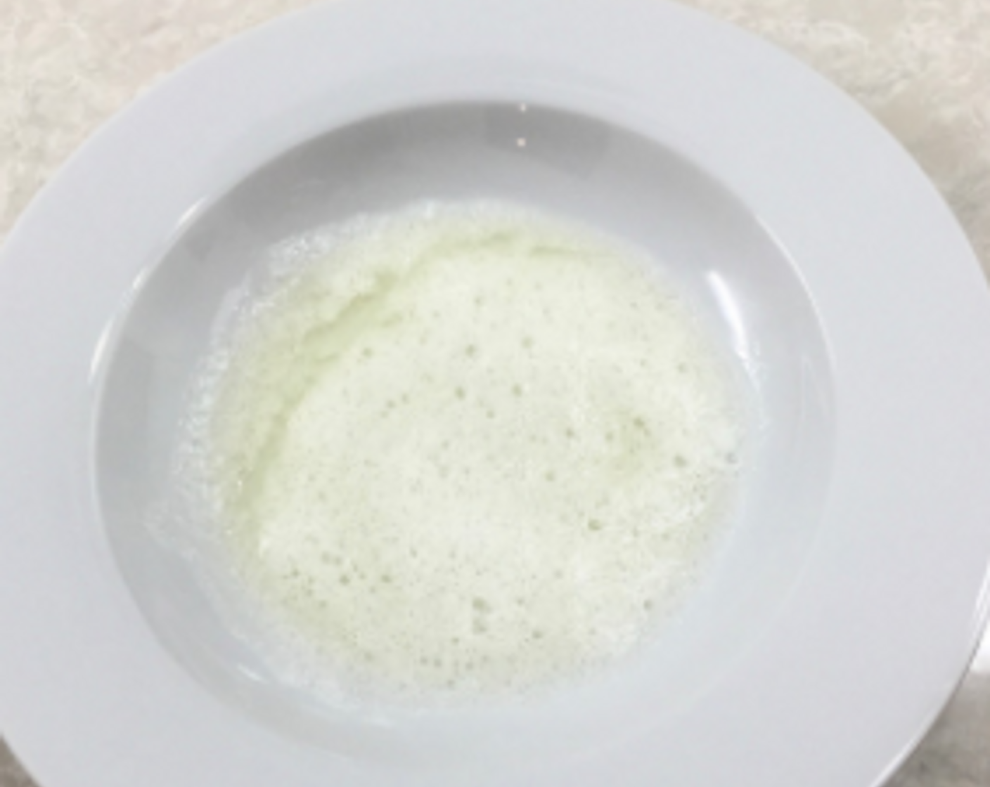 step 18 Pour it into another shallow bowl and set aside and we're ready to roll the chilled cookie dough.