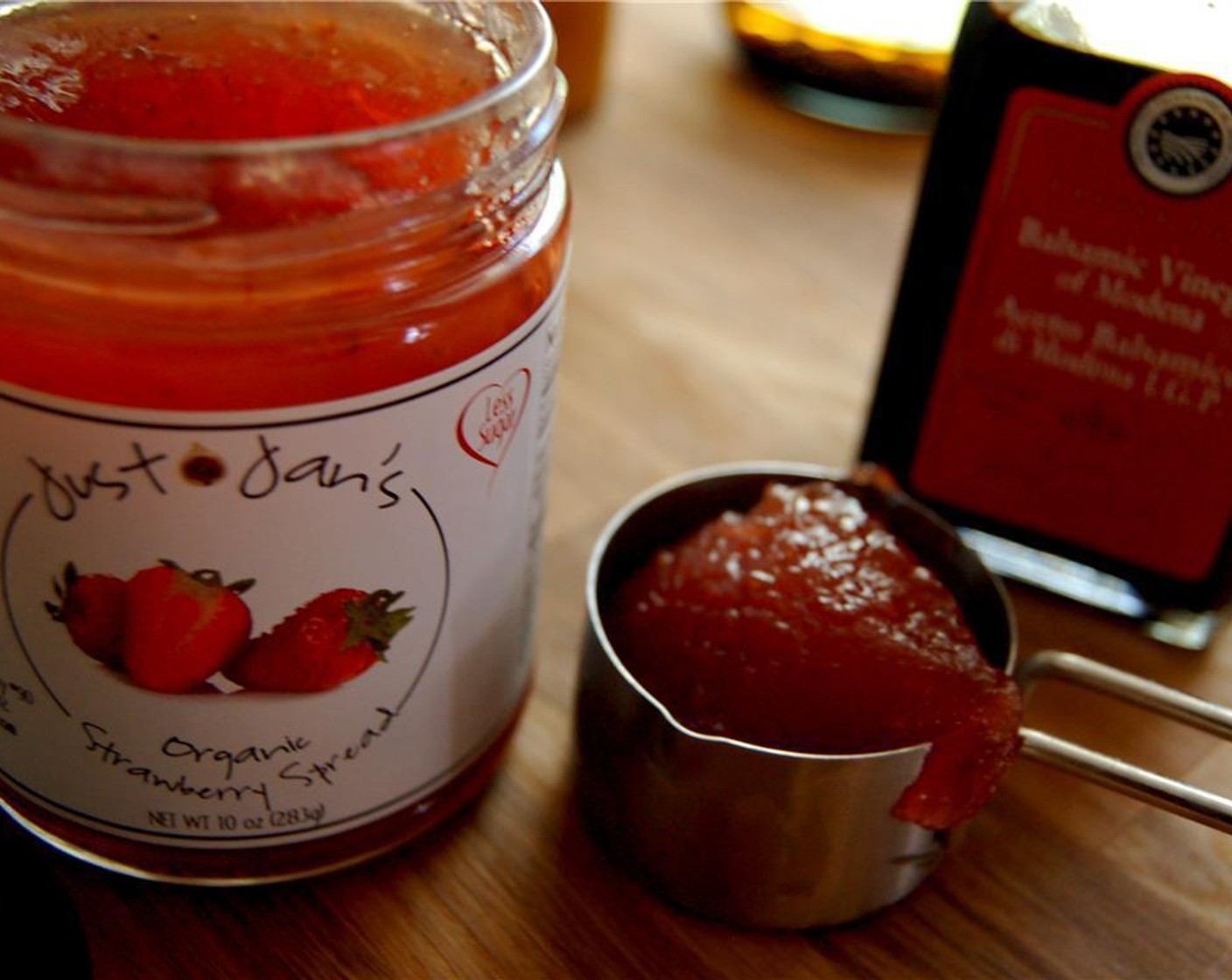 step 3 Measure the just jan’s organic Just Jan’s® Organic Strawberry Spread (4 Tbsp). This will be the base of your dressing.