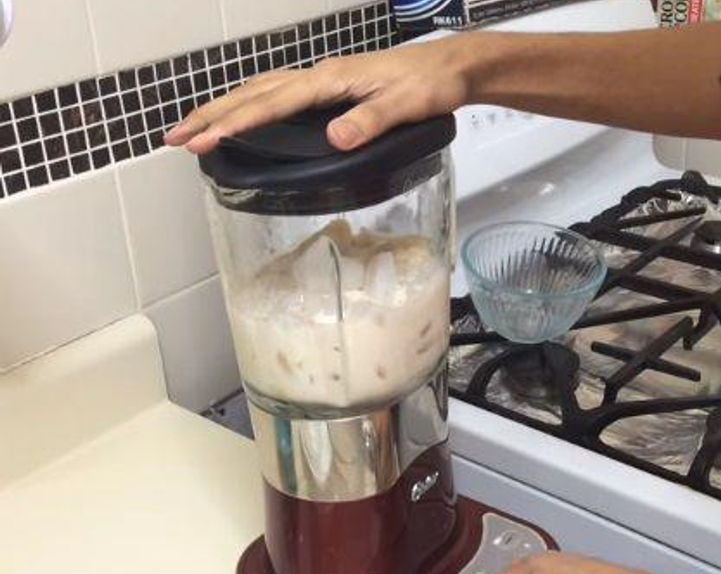 step 1 Into a blender, add and mix the Bananas (3), Evaporated Milk (12 fl oz), Milk (4 Tbsp), Granulated Sugar (4 Tbsp), Vanilla Extract (1 tsp), Ground Nutmeg (1/8 tsp), and Ice (to taste).