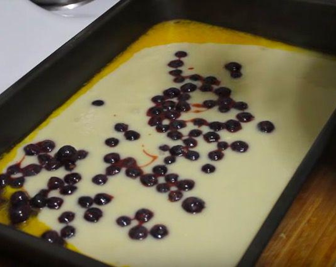 step 2 Put Egg (1) into Milk (2/3 cup) and whisk together and add in All-Purpose Flour (1 cup), Salt (1/2 tsp), Baking Powder (2 tsp), Granulated Sugar (1 cup) mixture. Pour the melted Butter (1/2 cup) in the pan and then pour the batter. Then, put the blueberry mixture on top evenly. Preheat the oven to 350 degrees F (180 degrees C) and bake for 40 minutes. Let cool.
