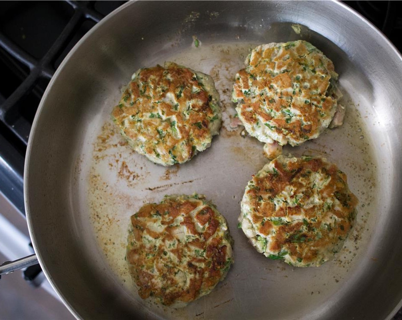 step 7 Heat the Extra-Virgin Olive Oil (2 Tbsp) in a large skillet over medium-high heat. Cook the tuna burgers, 2-3 minutes per side – don’t overcook the burgers or they will be dry. Transfer to a clean plate to rest.